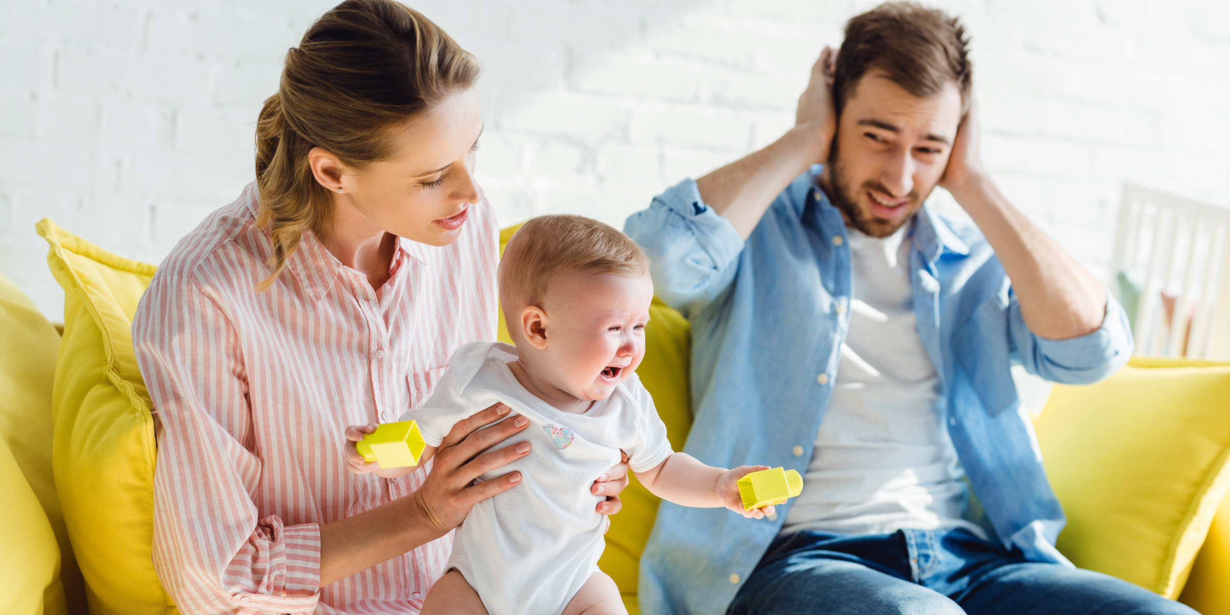 A couple with their baby | Source: Shutterstock