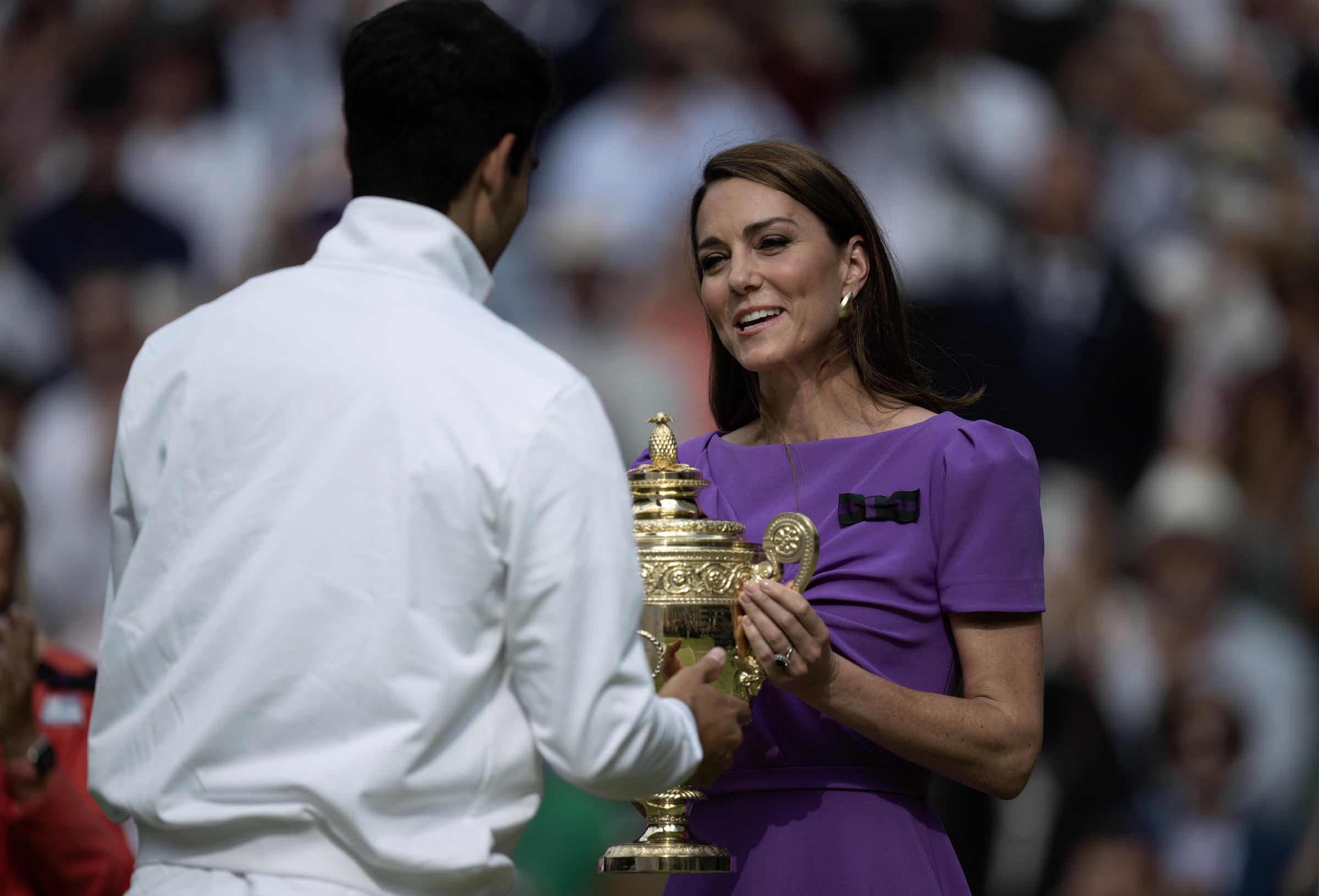 Kate Middleton presents Carlos Alcaraz with the winners trophy at The Championships Wimbledon 2024 on July 14, 2024, in London, England. | Source: Getty Images