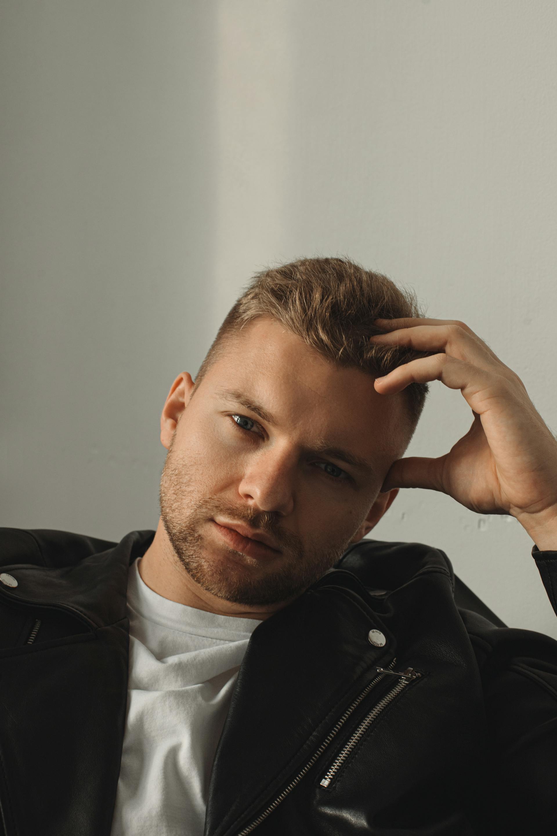 A thoughtful man looking at someone | Source: Pexels