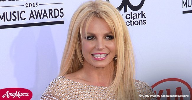 Britney Spears flashes belly as she shares video from playful day with children