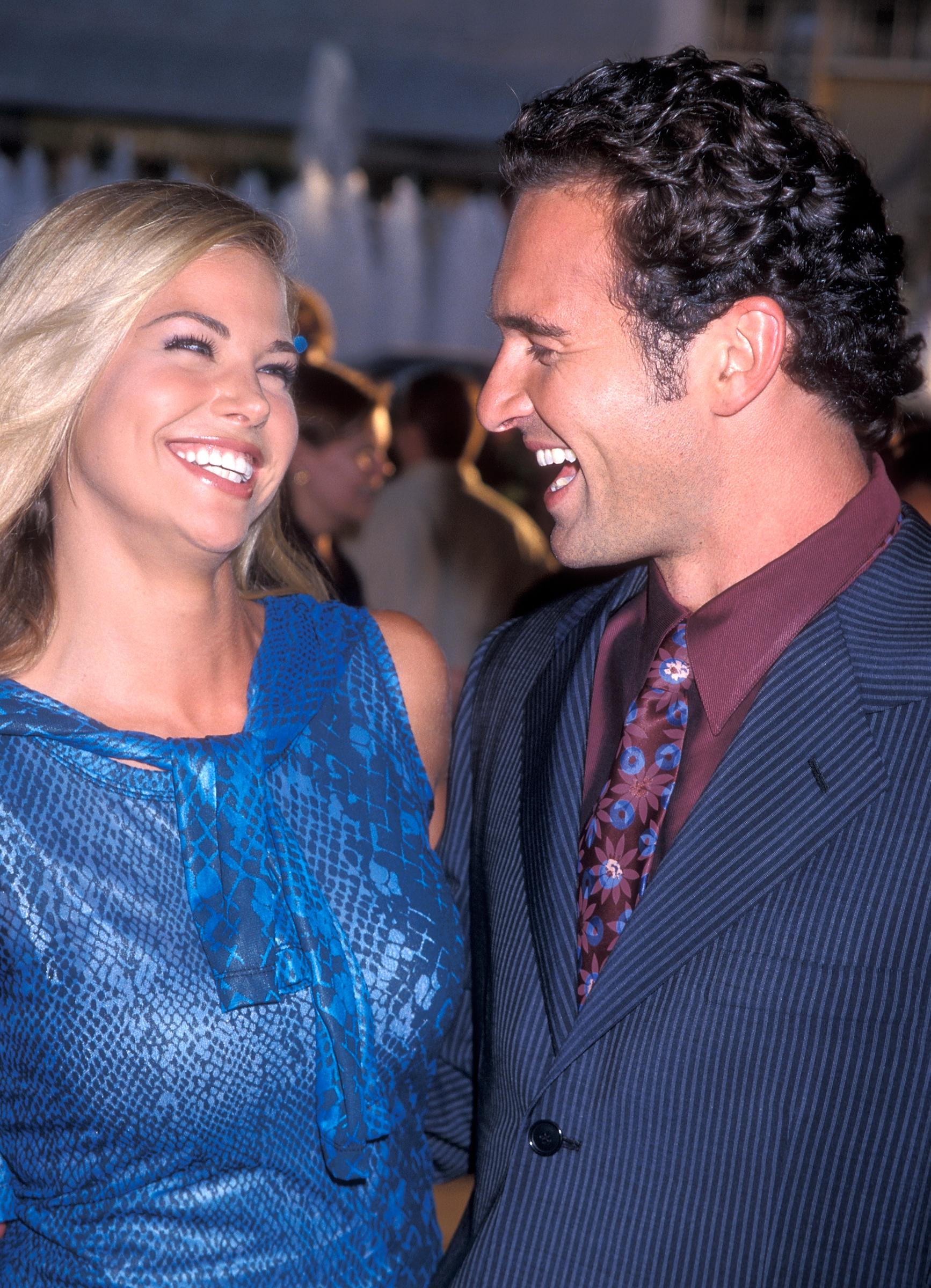 Brooke Burns and Julian McMahon attend the "Why Do Fools Fall in Love" Century City premiere on August 26, 1998, at the Cineplex Odeon Century Plaza Cinemas in Century City, California | Source: Getty Images
