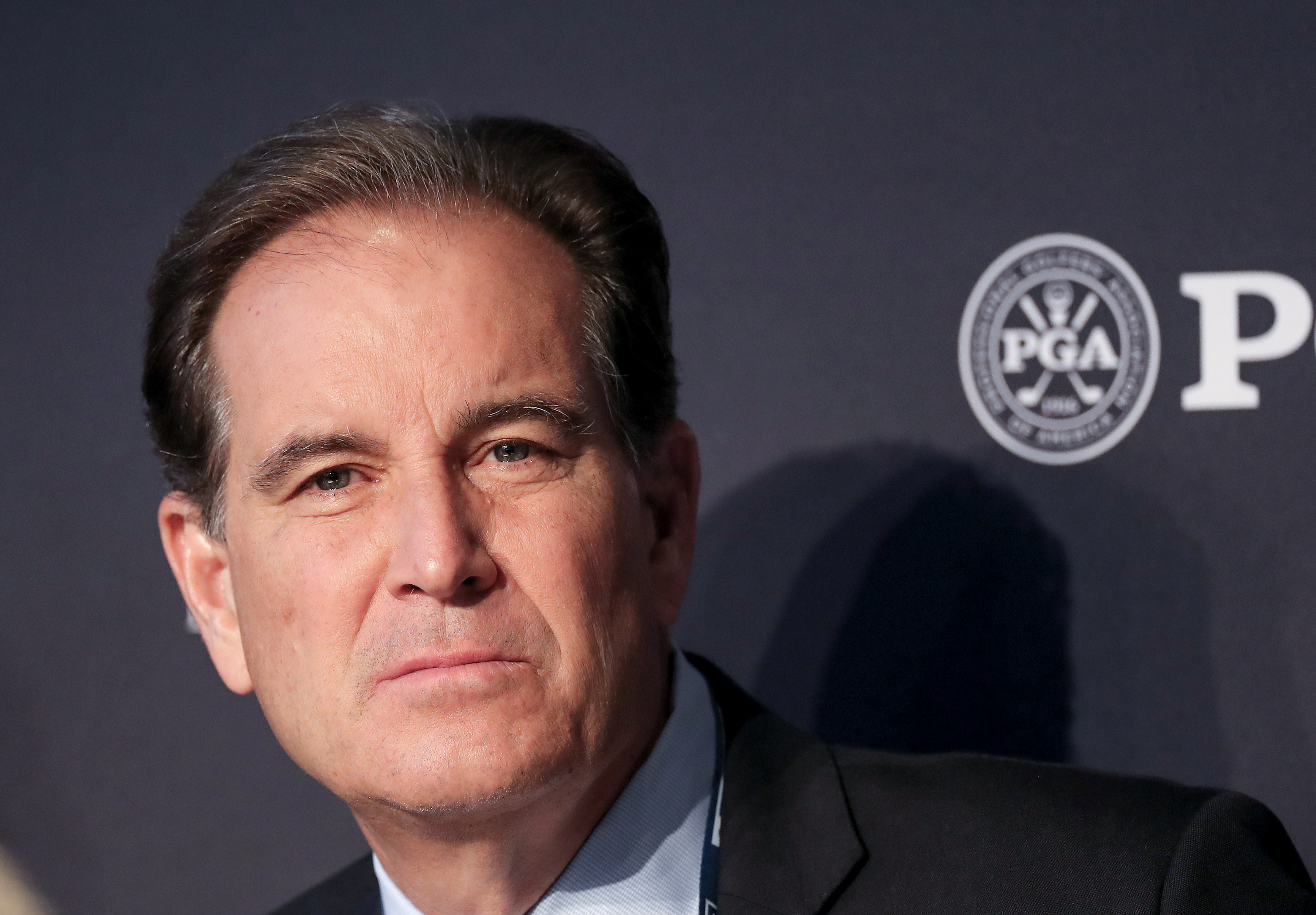Jim Nantz speaks to the media on stage during the CBS Television team press conference as a preview for the 2019 PGA Championship on the Black Course at Bethpage State Park on May 15, 2019, in Farmingdale, New York | Source: Getty Images