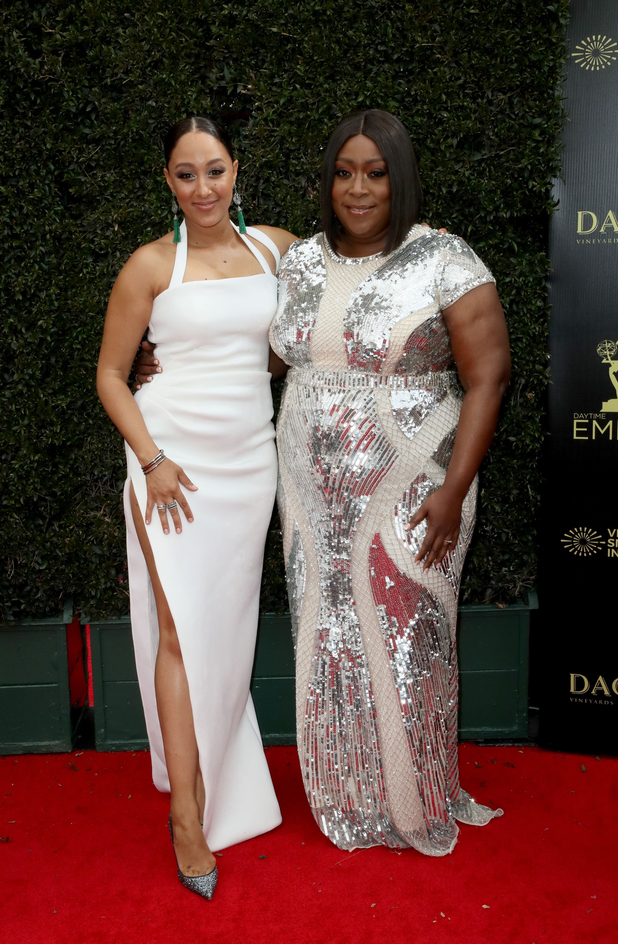 Loni Love and "The Real" co-host Tamera Mowry at the 2019 Emmy Daytime Awards | Source: Getty Images