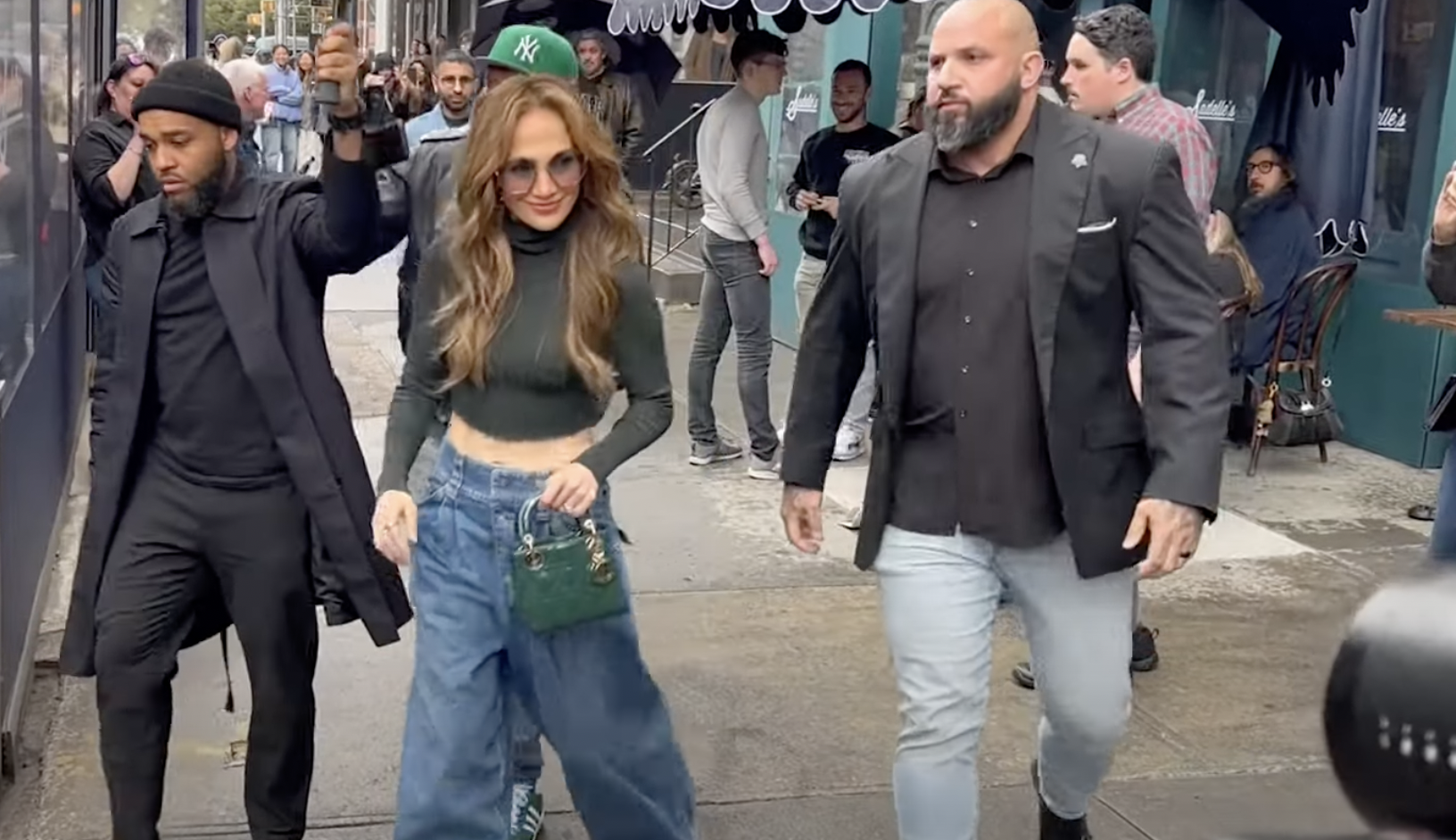 Jennifer Lopez pictured leaving Sadelle's restaurant in New York | Source: YouTube/HollywoodPipeline