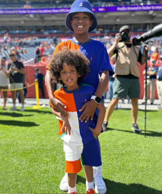 Ciara's sons, Future Zahir Wilburn and Win Wilson, on a football field on September 23, 2023 | Source: Instagram/ciara