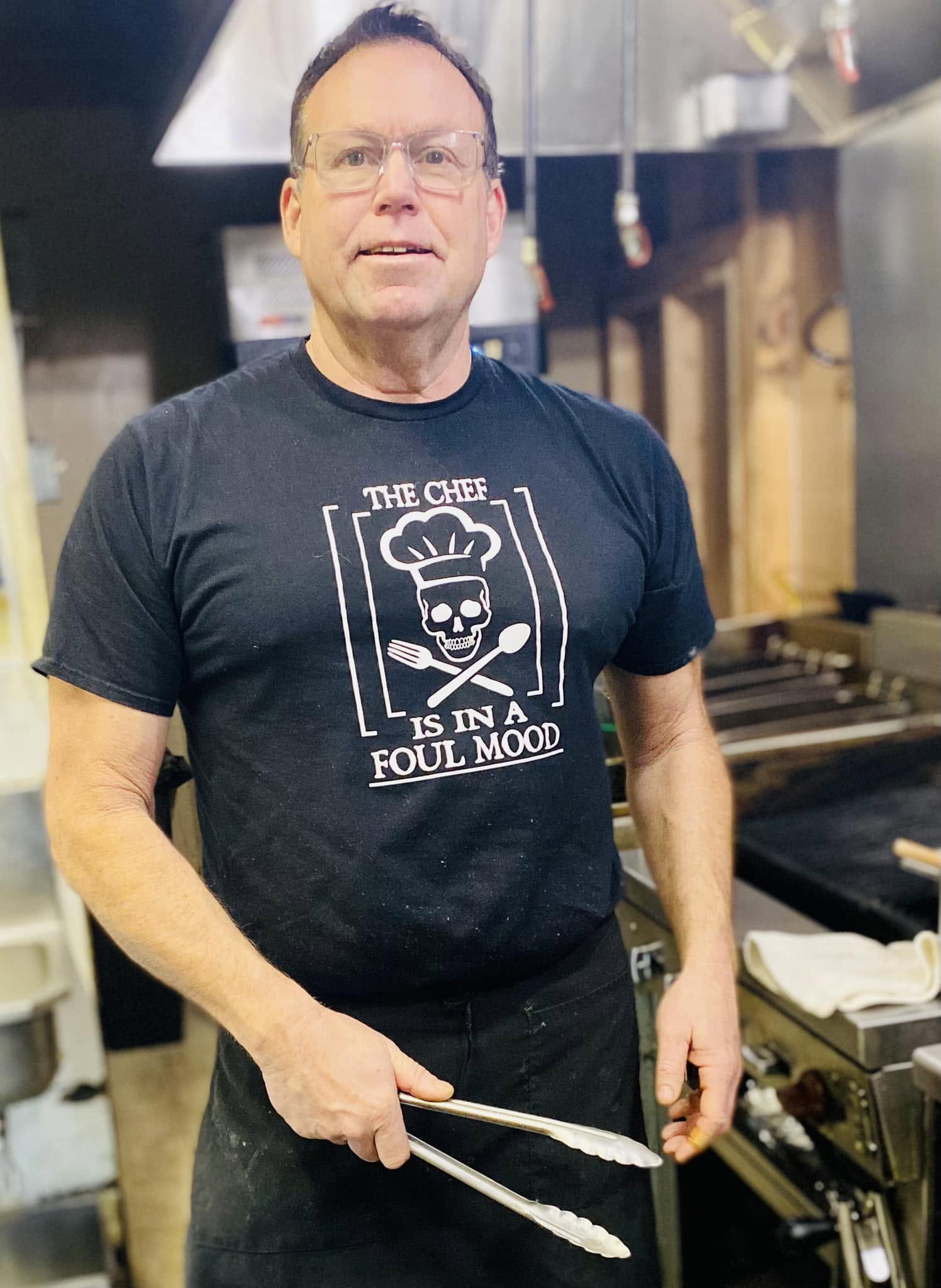 Christopher Claunch, one of the victims of the In-N-Out shooting in Idaho, in a photo while working at a restaurant, posted on February 6, 2023. | Source: Facebook/Snake River Grill
