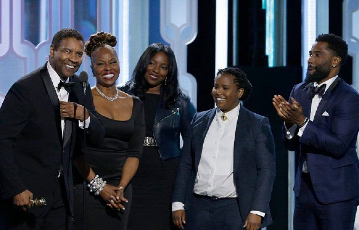 Denzel Washington and his family during the 73rd Annual Golden Globe Awards at The Beverly Hilton Hotel on January 10, 2016, in California | Source: Getty Images