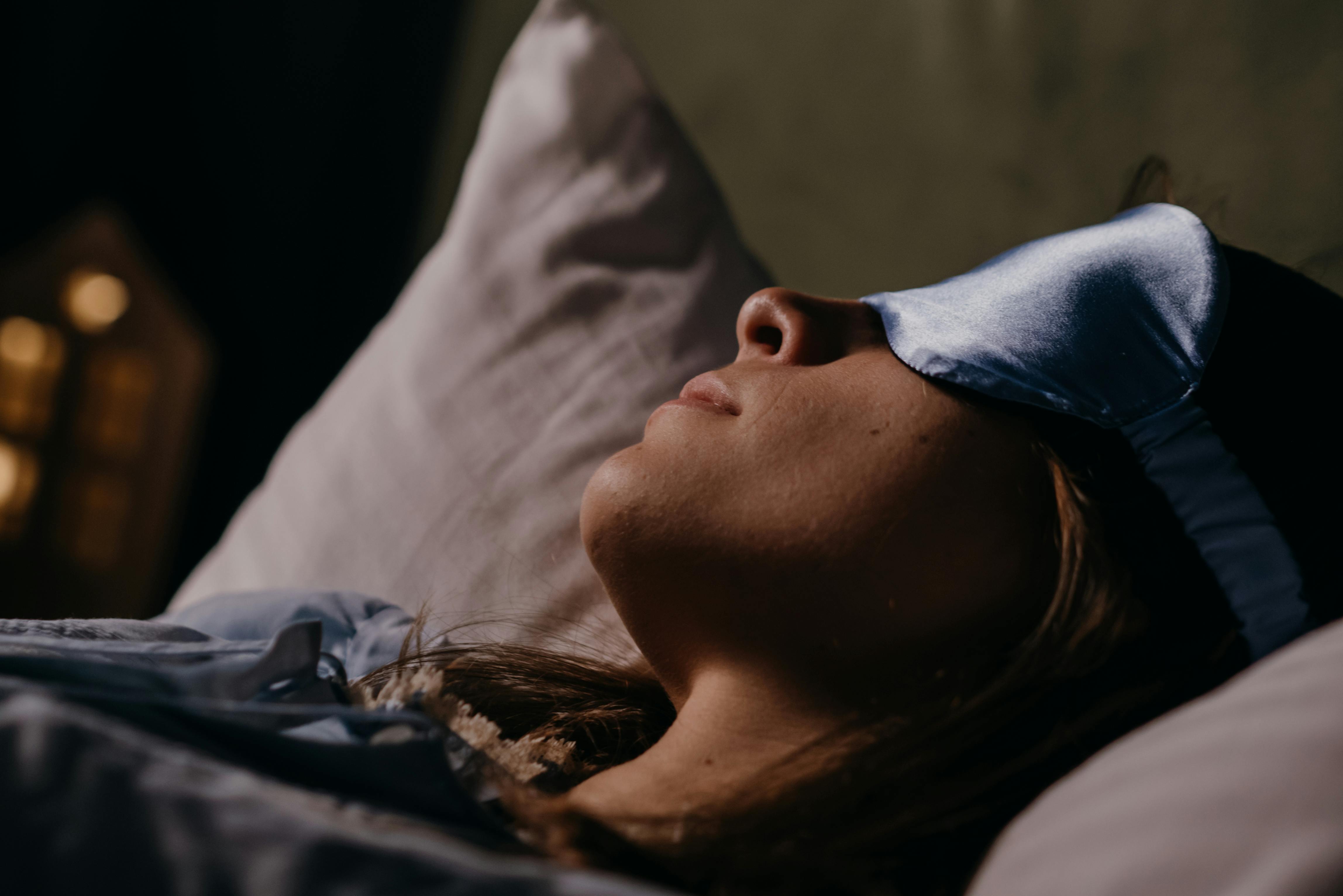 A woman sleeping with an eye mask | Source: Pexels