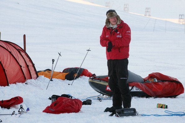  Prince Harry takes down his tent as he joins the Walking with the Wounded team on the island of Spitsbergen, for training before they start their charity trek to the North Pole, on March 31, 2011, in Spitsbergen, Norway. | Source: Getty Images.