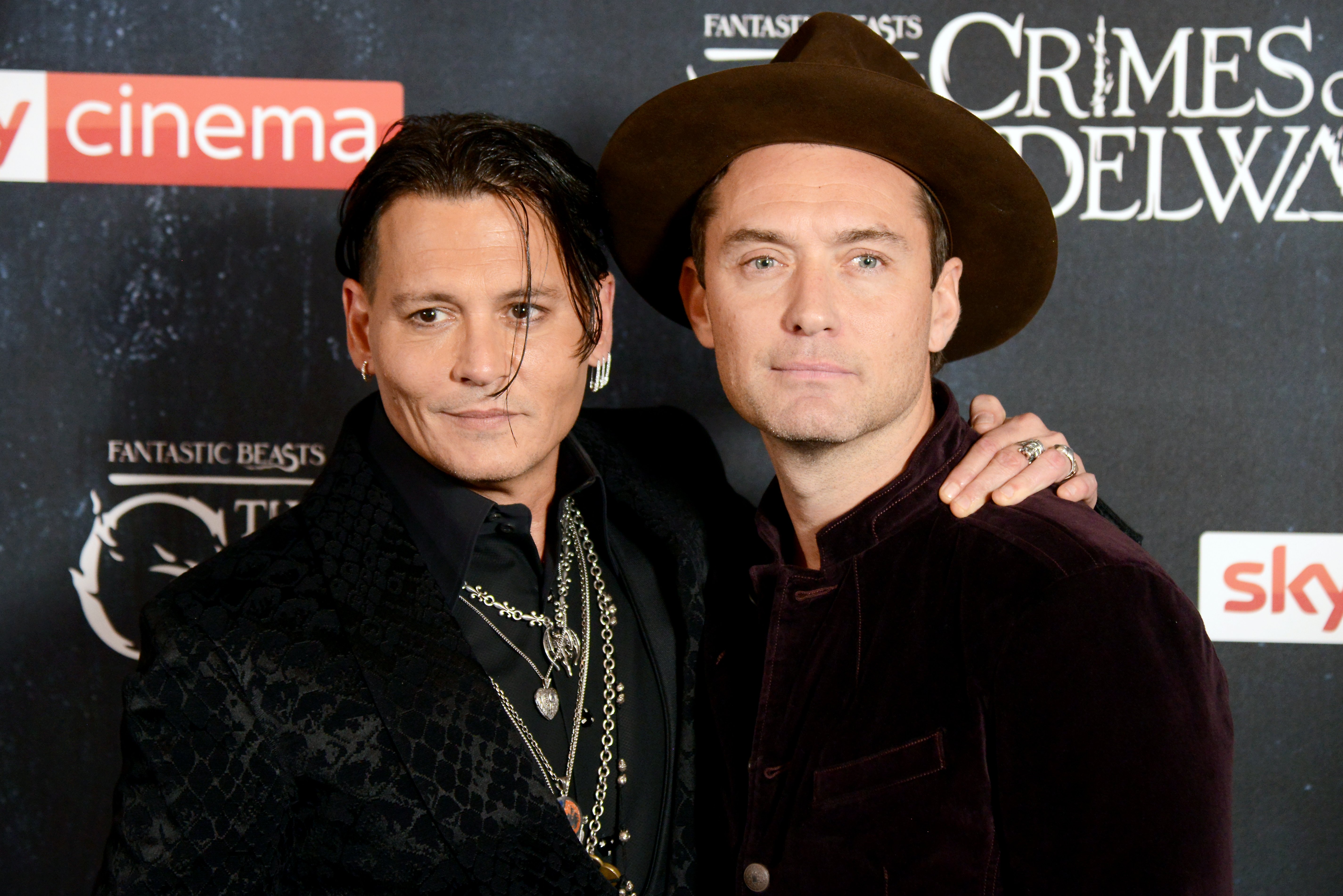 Johnny Depp (L) and Jude Law attend 'Fantastic Beasts: The Crimes Of Grindelwald' UK Premiere at Cineworld Leicester Square on November 13, 2018 in London, England. | Source: Getty Images