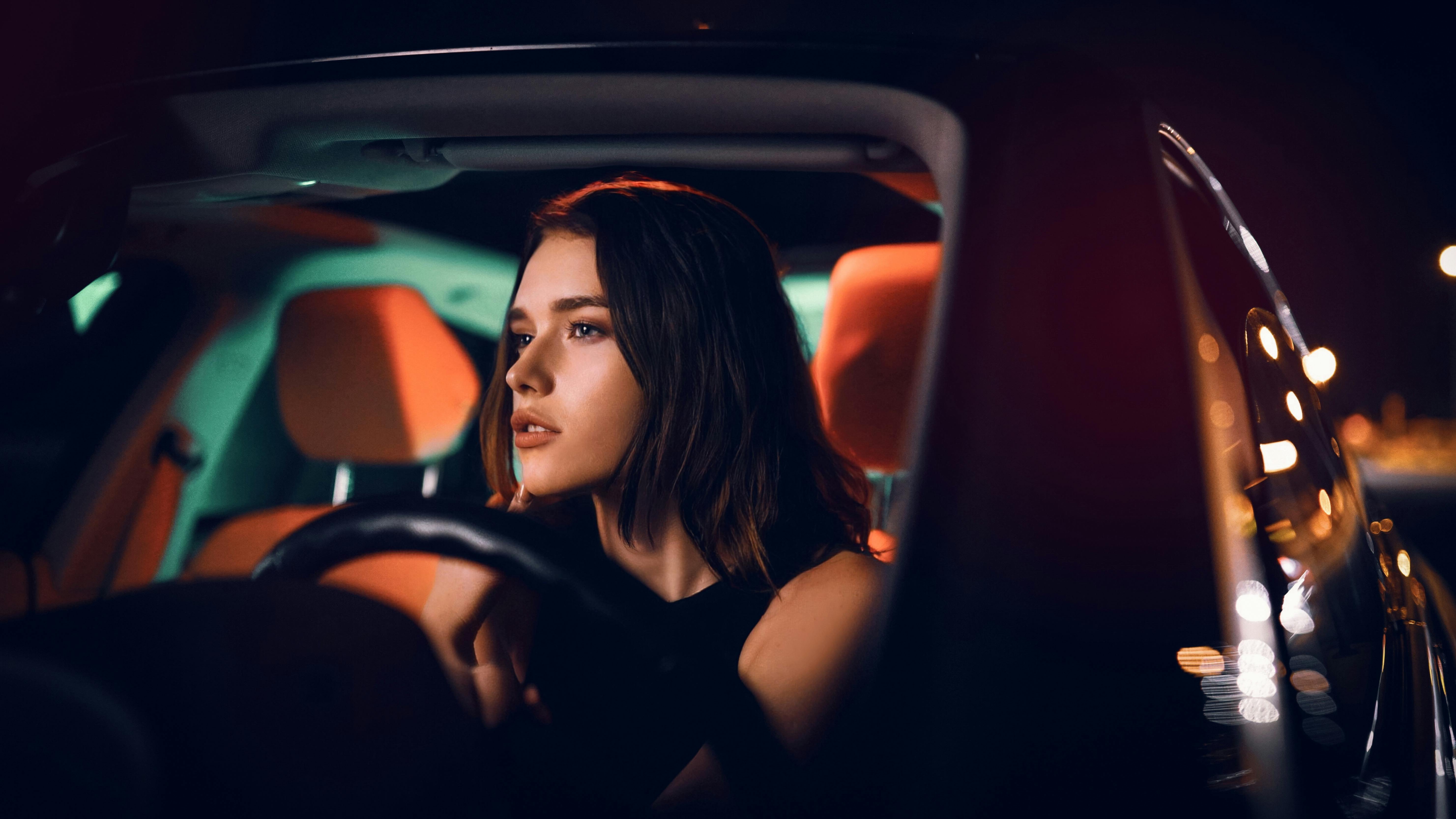 A serious woman in the driver's seat of a car | Source: Pexels