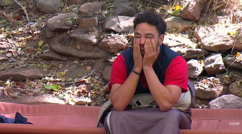 Adam Thomas looks visibly drained as he presses his hands to his face in camp, capturing the emotional toll of the tense exchange. | Source: YouTube/I'm A Celebrity... Get Me Out Of Here!