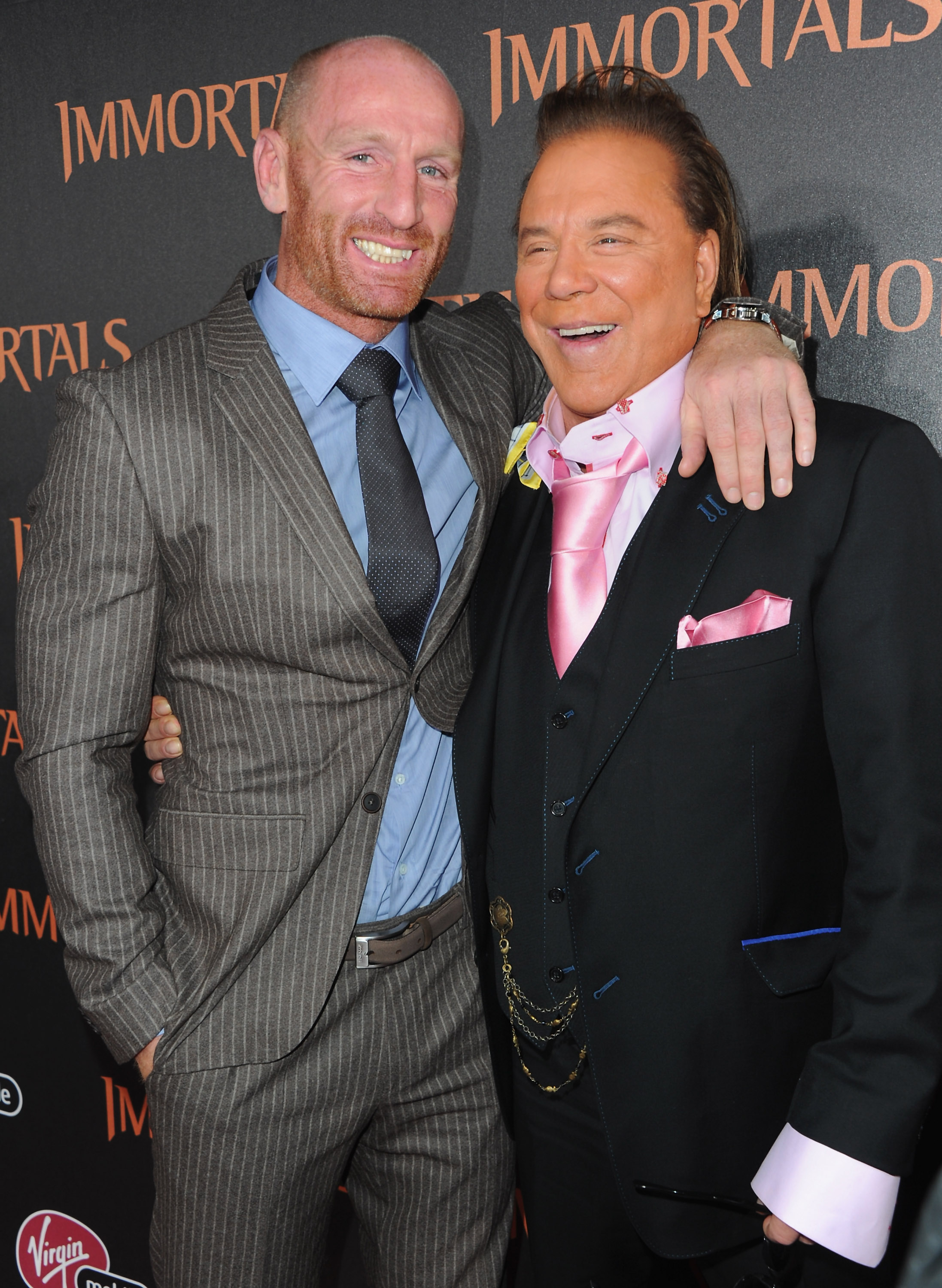 Gareth Thomas and Mickey Rourke arrive at Relativity Media's "Immortals" premiere at Nokia Theatre L.A. Live on November 7, 2011, in Los Angeles, California. | Source: Getty Images