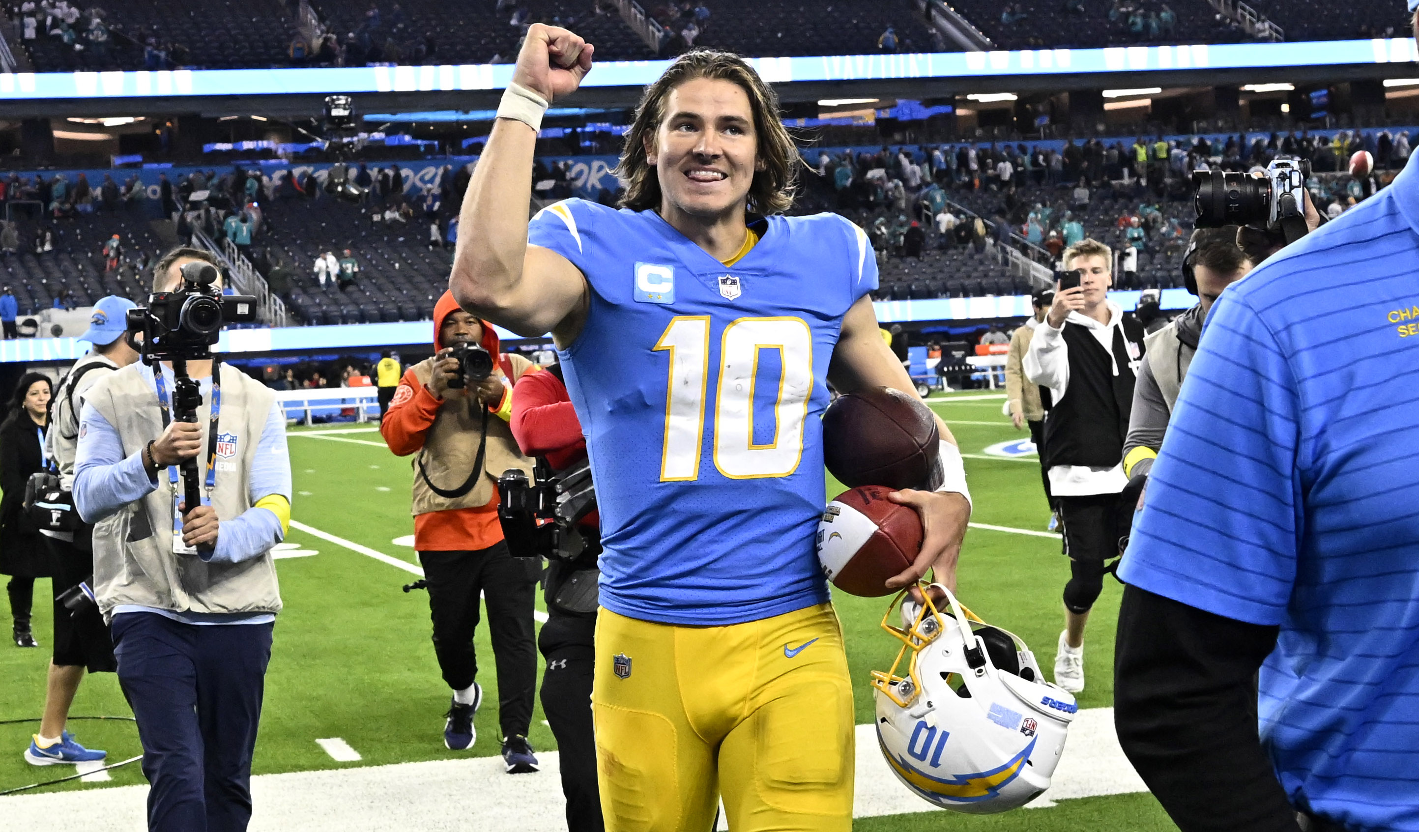 Justin Herbert of the Los Angeles Chargers reacts toward the crowd after defeating the Miami Dolphins 23-17 during a NFL football game at SoFi Stadium on December 11, 2022, in Inglewood, California. | Source: Getty Images