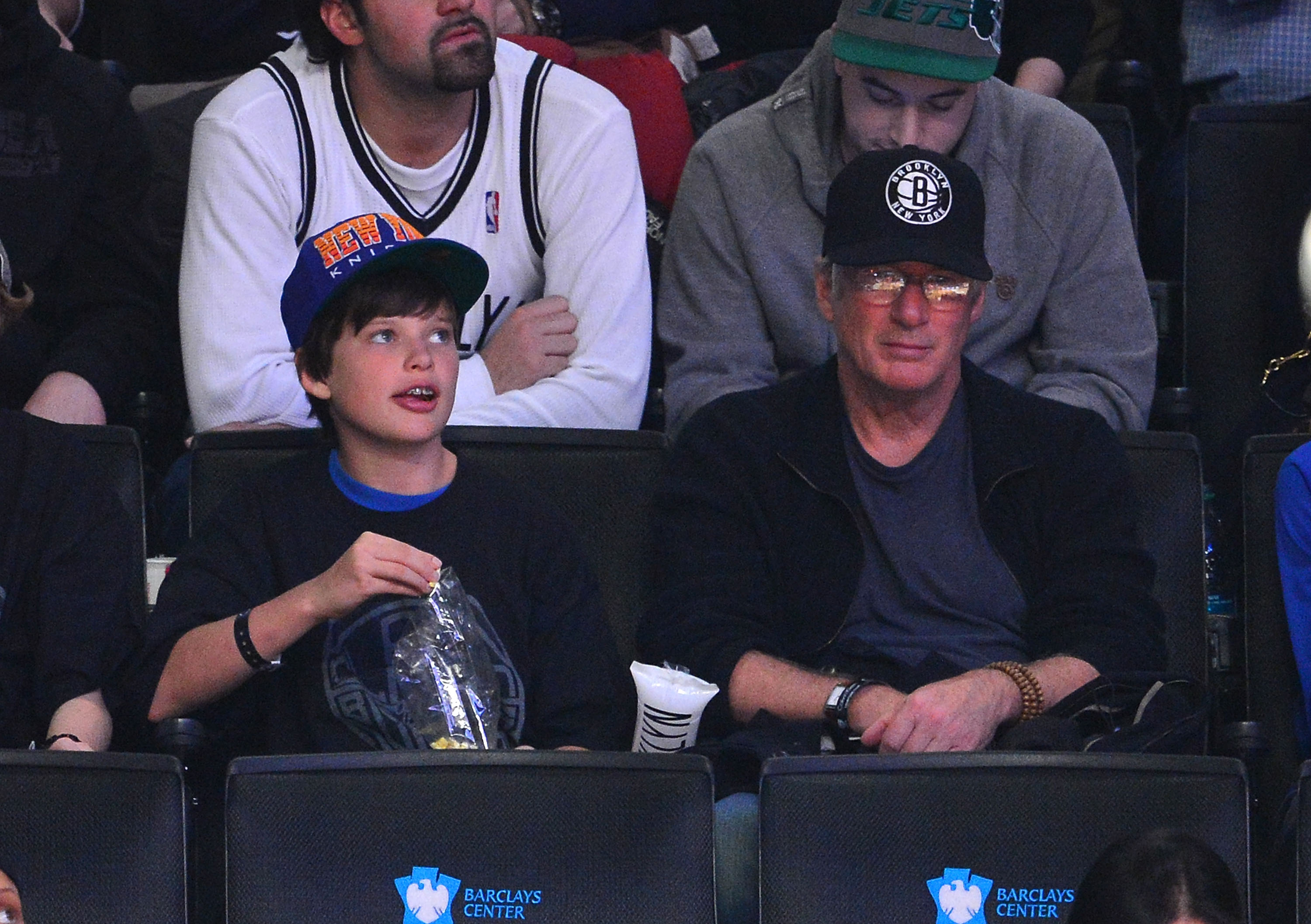 Richard Gere with his son Homer James at Barclays Center on November 26, 2012 in the Brooklyn borough of New York City | Source: Getty Images