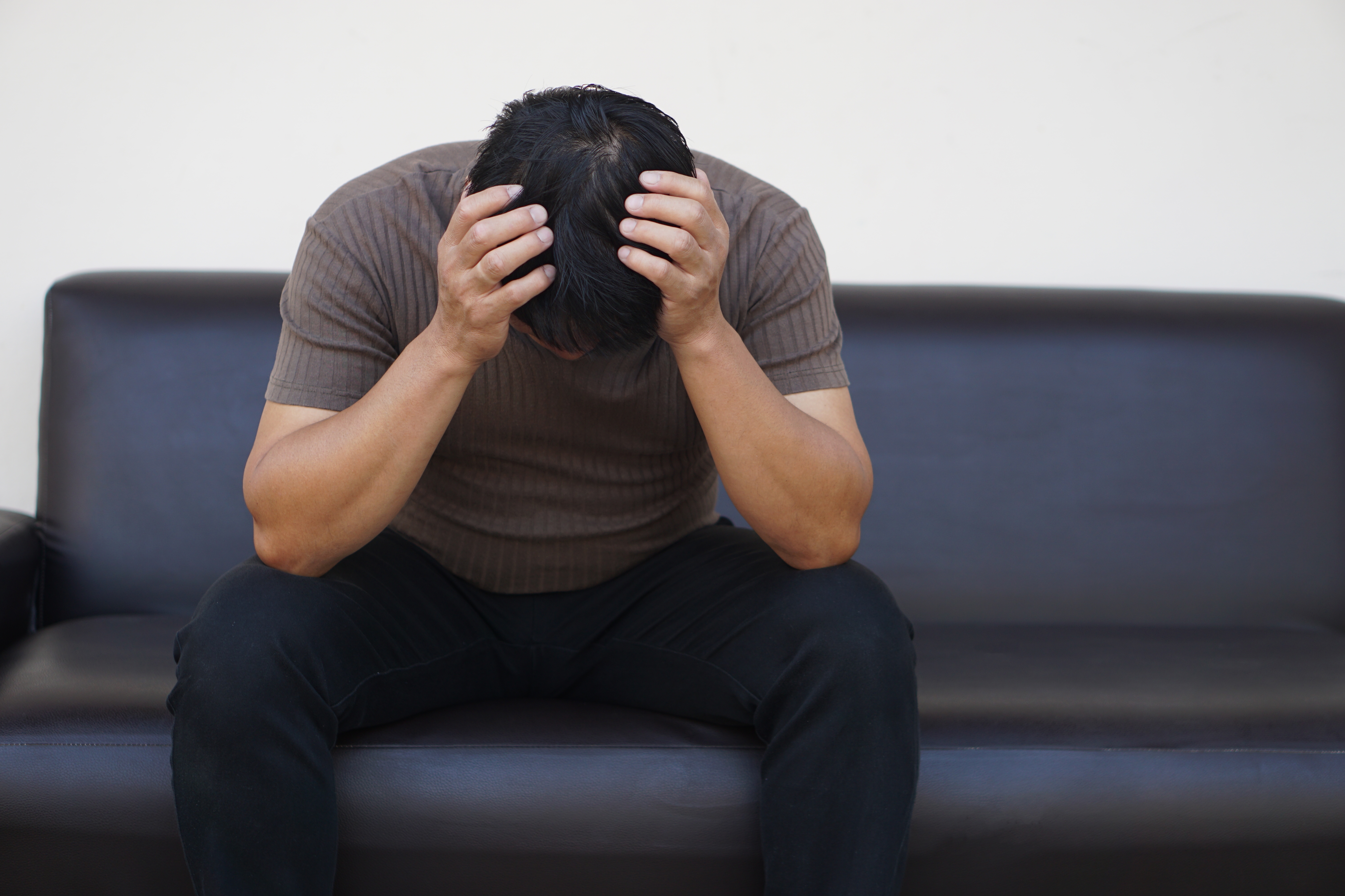 Man feeling depressed | Source: Shutterstock
