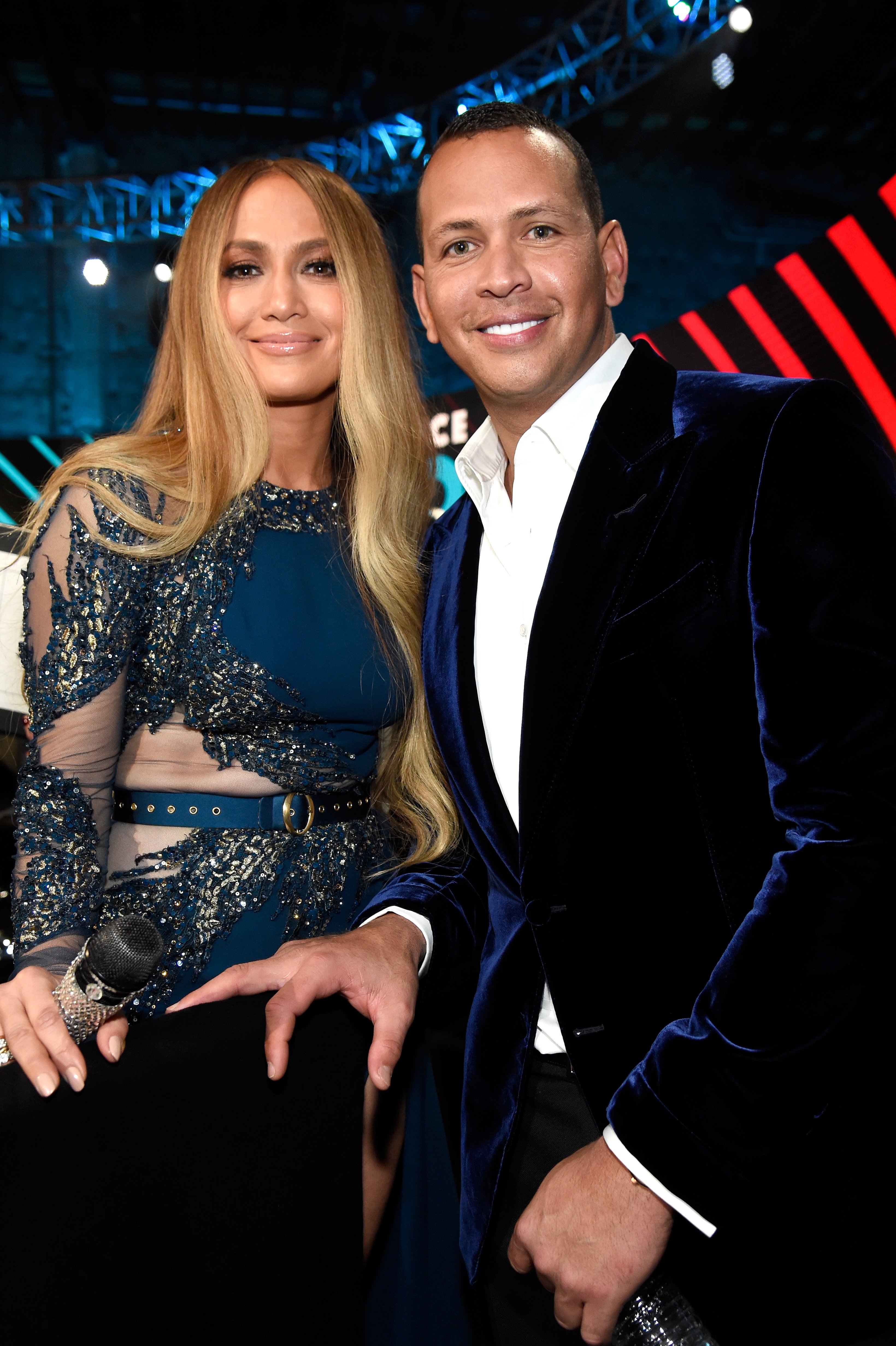 Jennifer Lopez and Alex Rodriguez pose during "One Voice: Somos Live! A Concert For Disaster Relief" at the Universal Studios. | Source: Getty Images