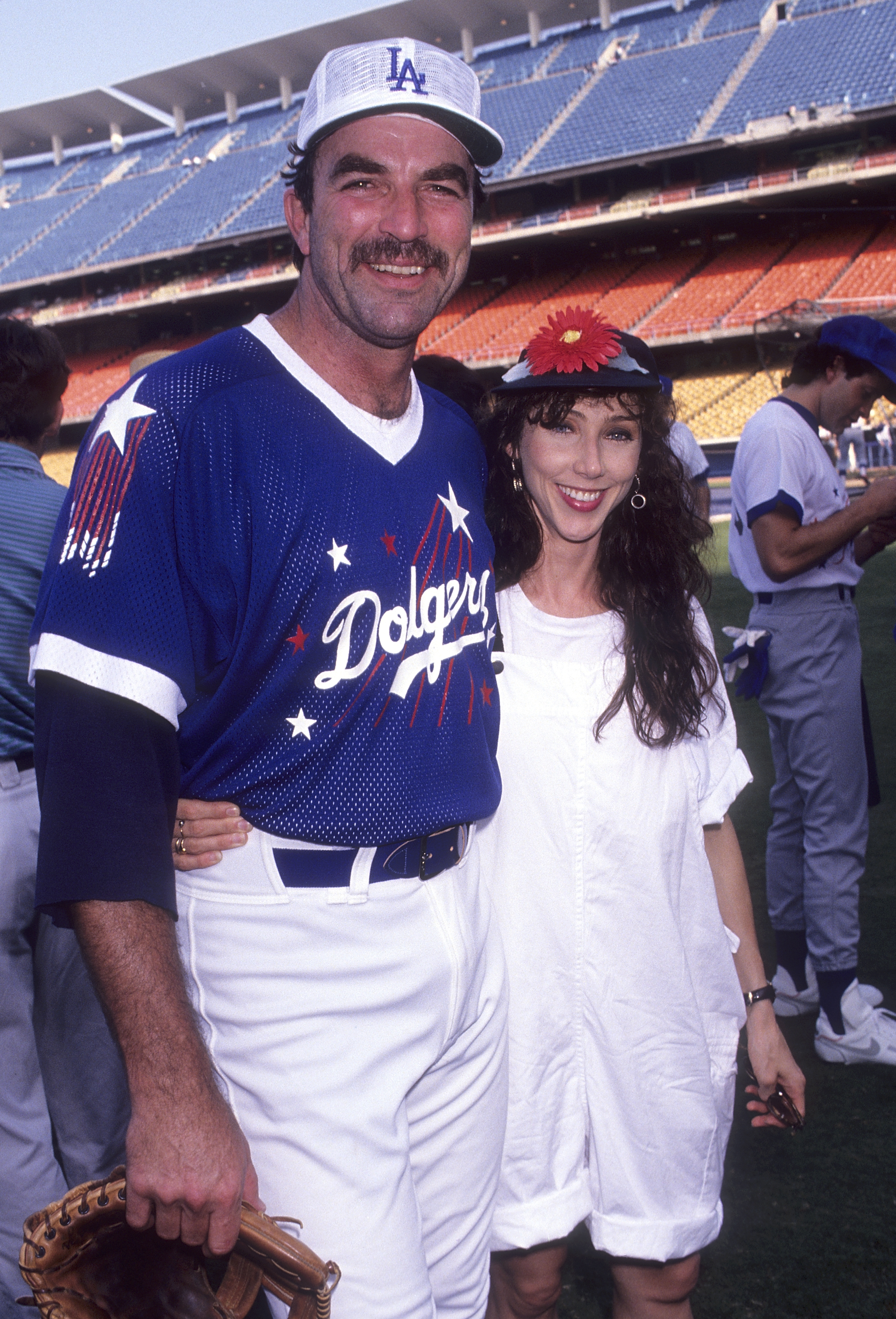 Tom Selleck and Jillie Mack at the 34th Annual "Hollywood Stars Night" Celebrity Baseball Game on August 17, 1991, at Dodger Stadium in Los Angeles, California. | Source: Getty Images
