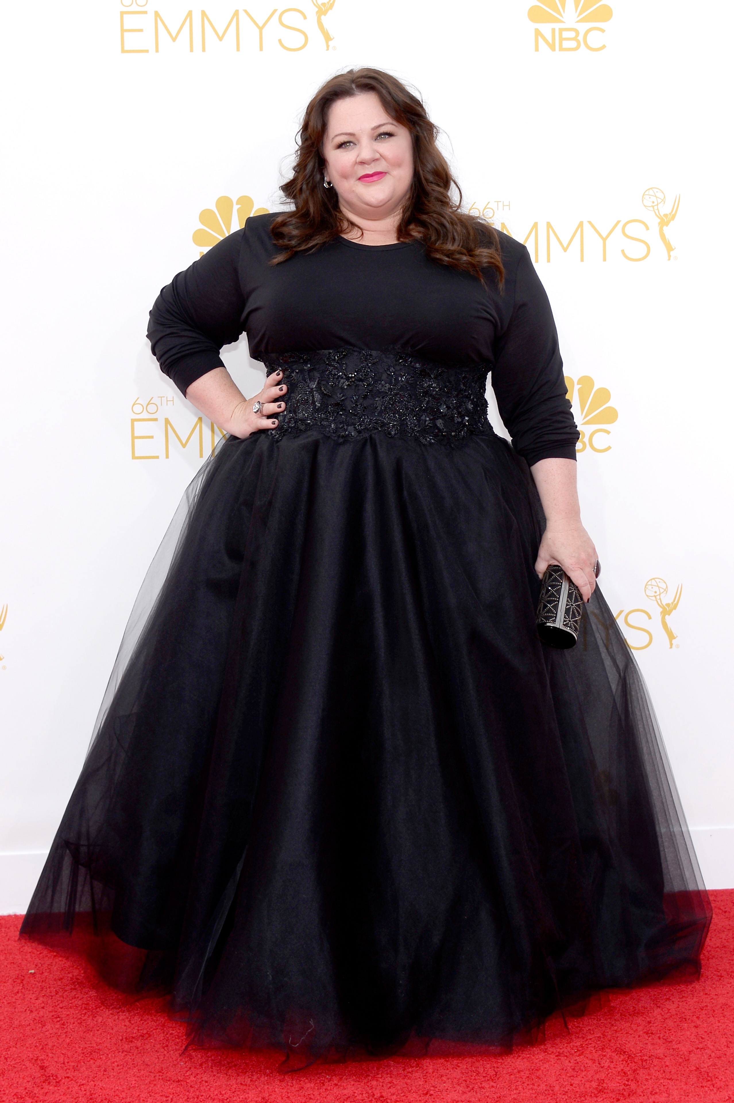 At the 2014 Emmys, McCarthy made a bold statement in a voluminous black gown, leaning into dramatic silhouettes and a more fashion-forward red carpet presence.