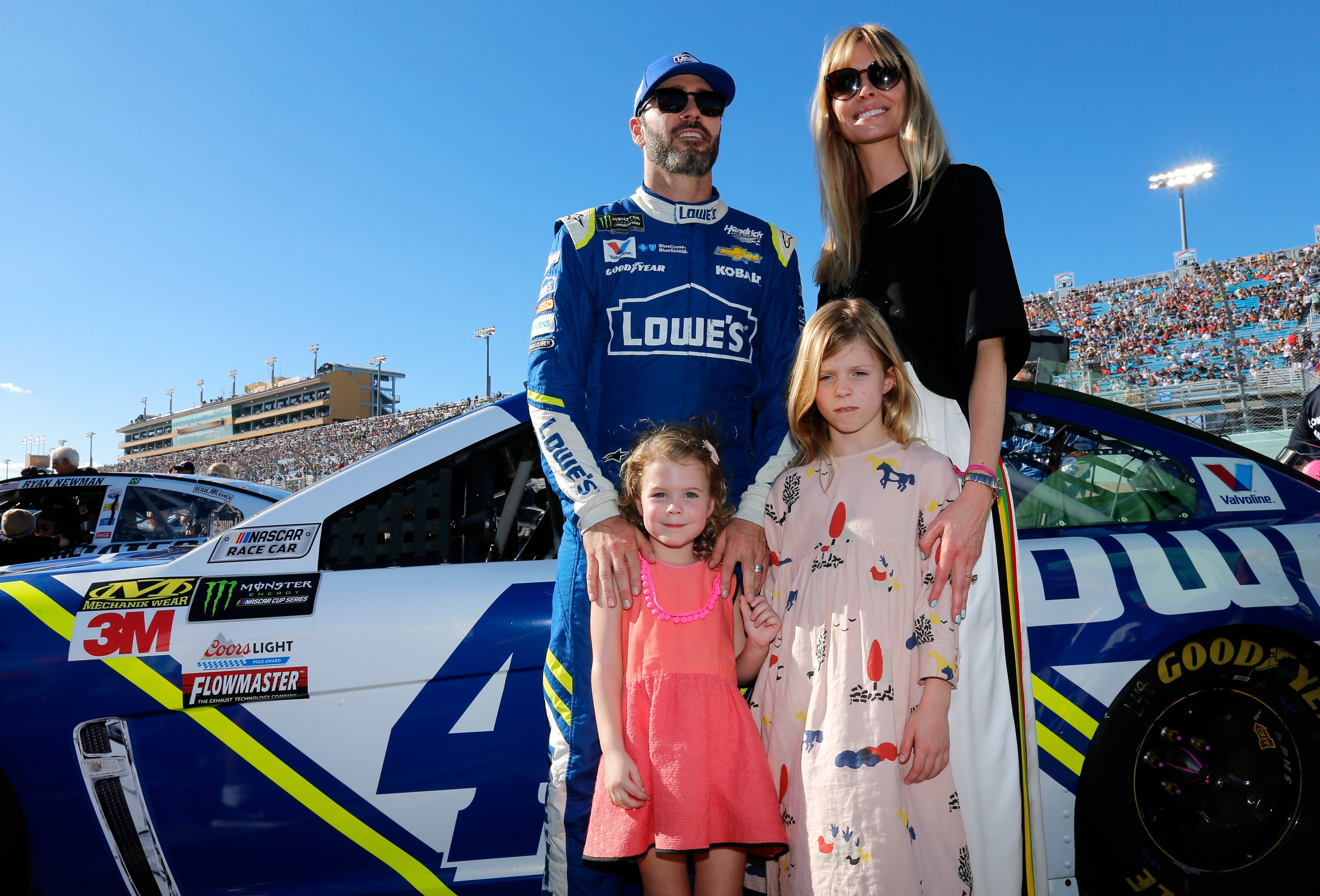 Jimmie Johnson with his wife Chandra and his daughters Genevieve and Lydia before the Monster Energy NASCAR Cup Series Championship on November 19, 2017, in Homestead, Florida. Source: Getty Images.