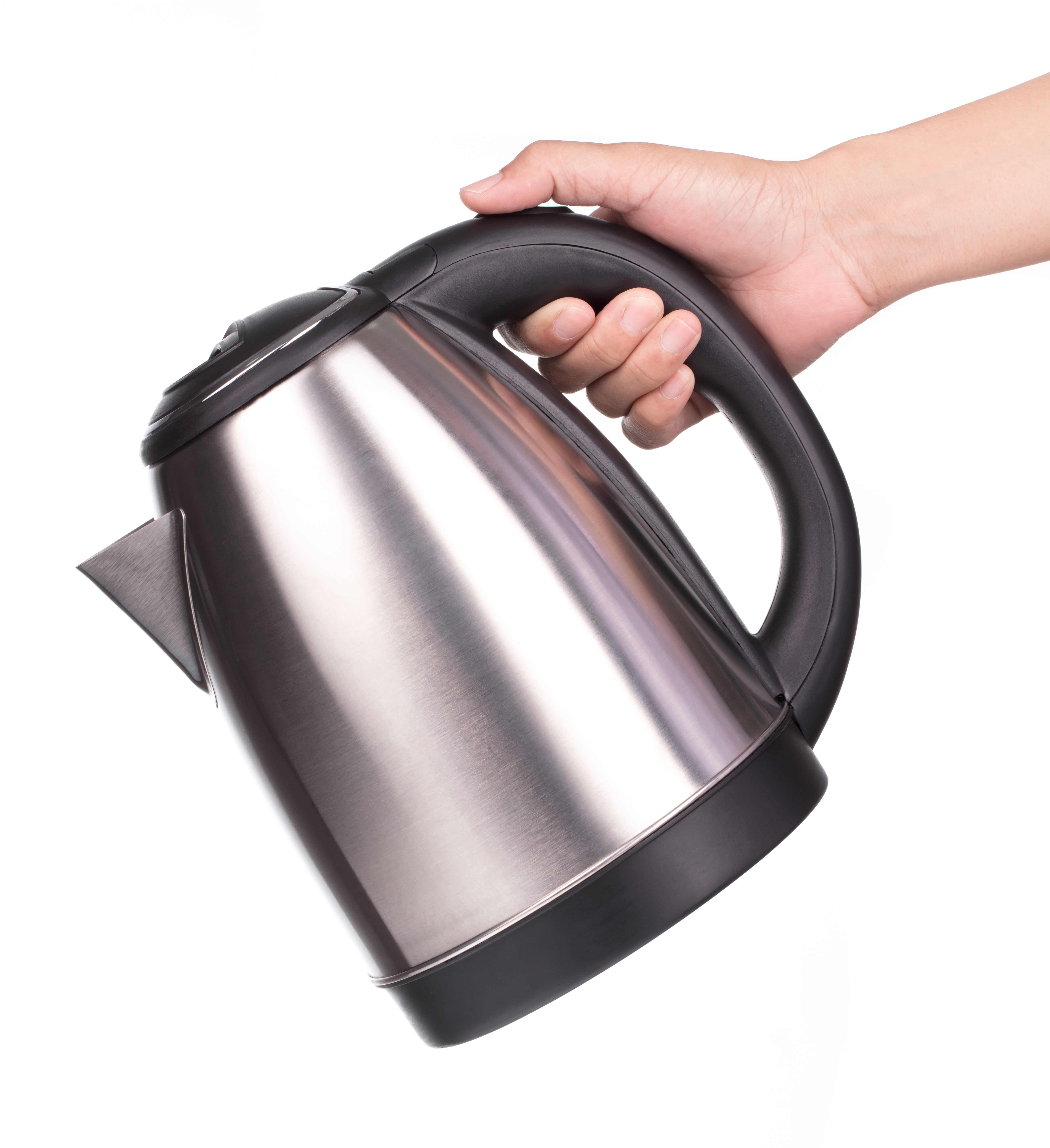 A person holding a modern electric kettle | Source: Shutterstock