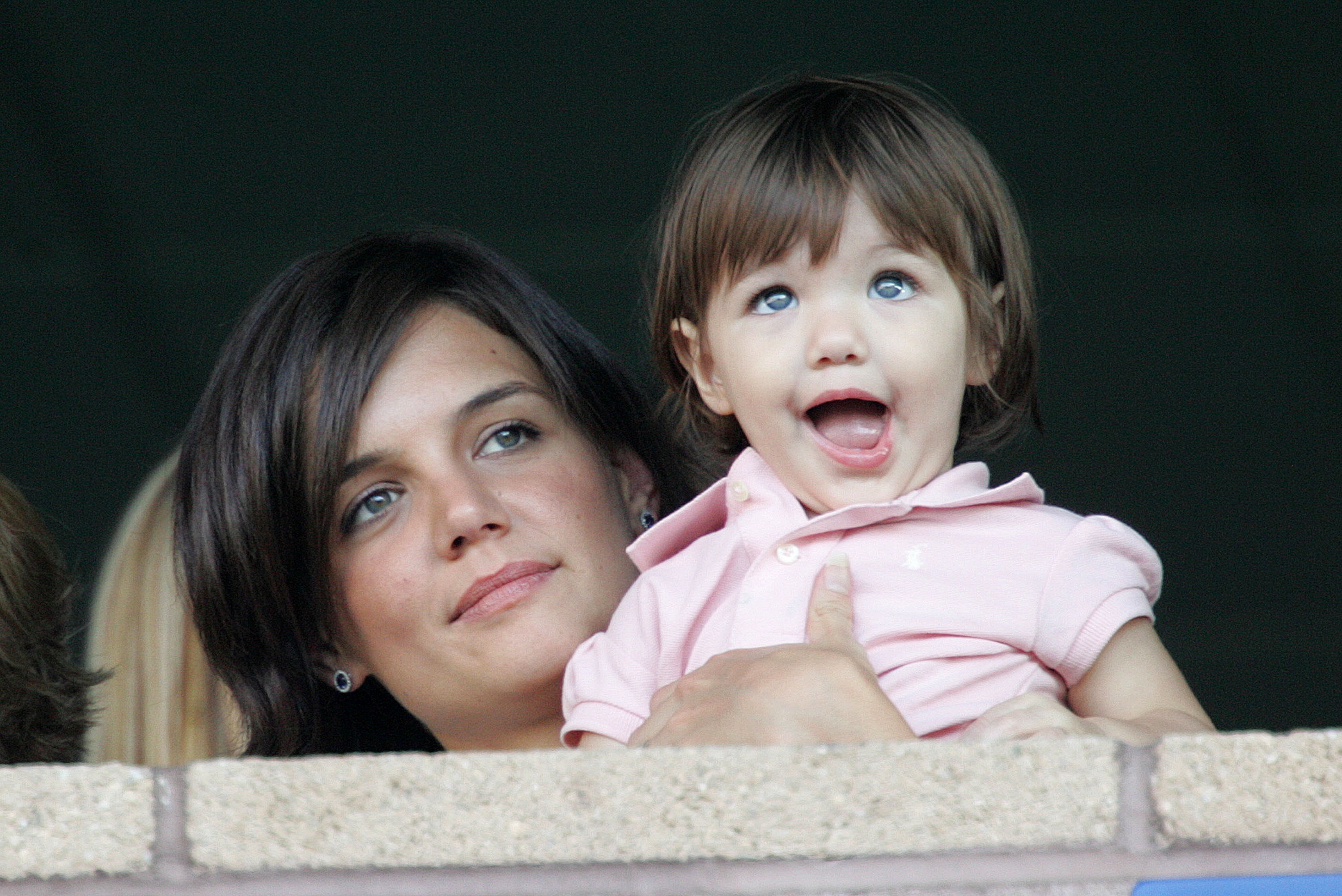 Katie Holmes and daughter Suri Cruise watch the LA Galaxy vs. Chelsea FC soccer game in California on July 22, 2007 | Source: Getty Images