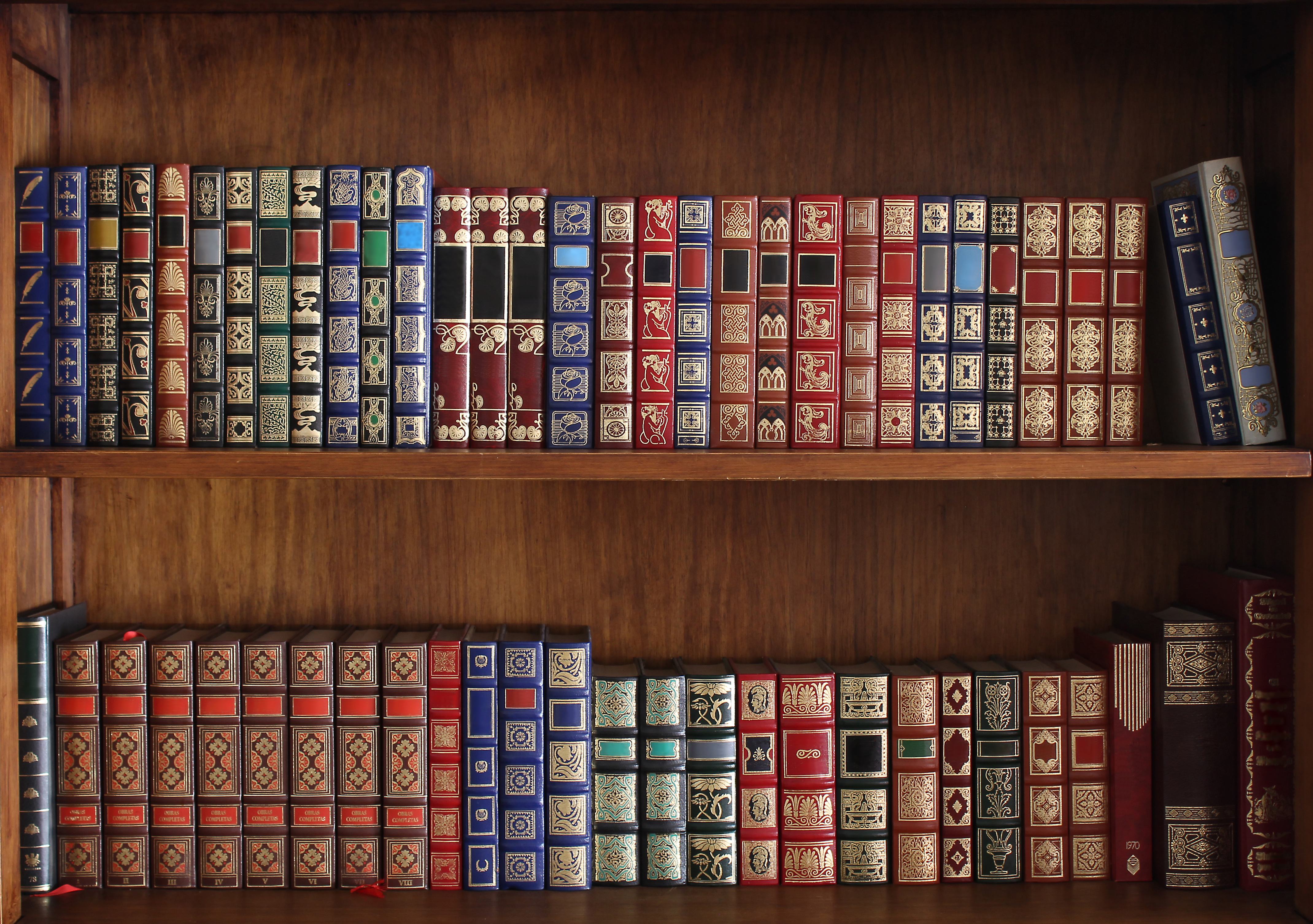 Library shelves full of old books | Source: Shutterstock