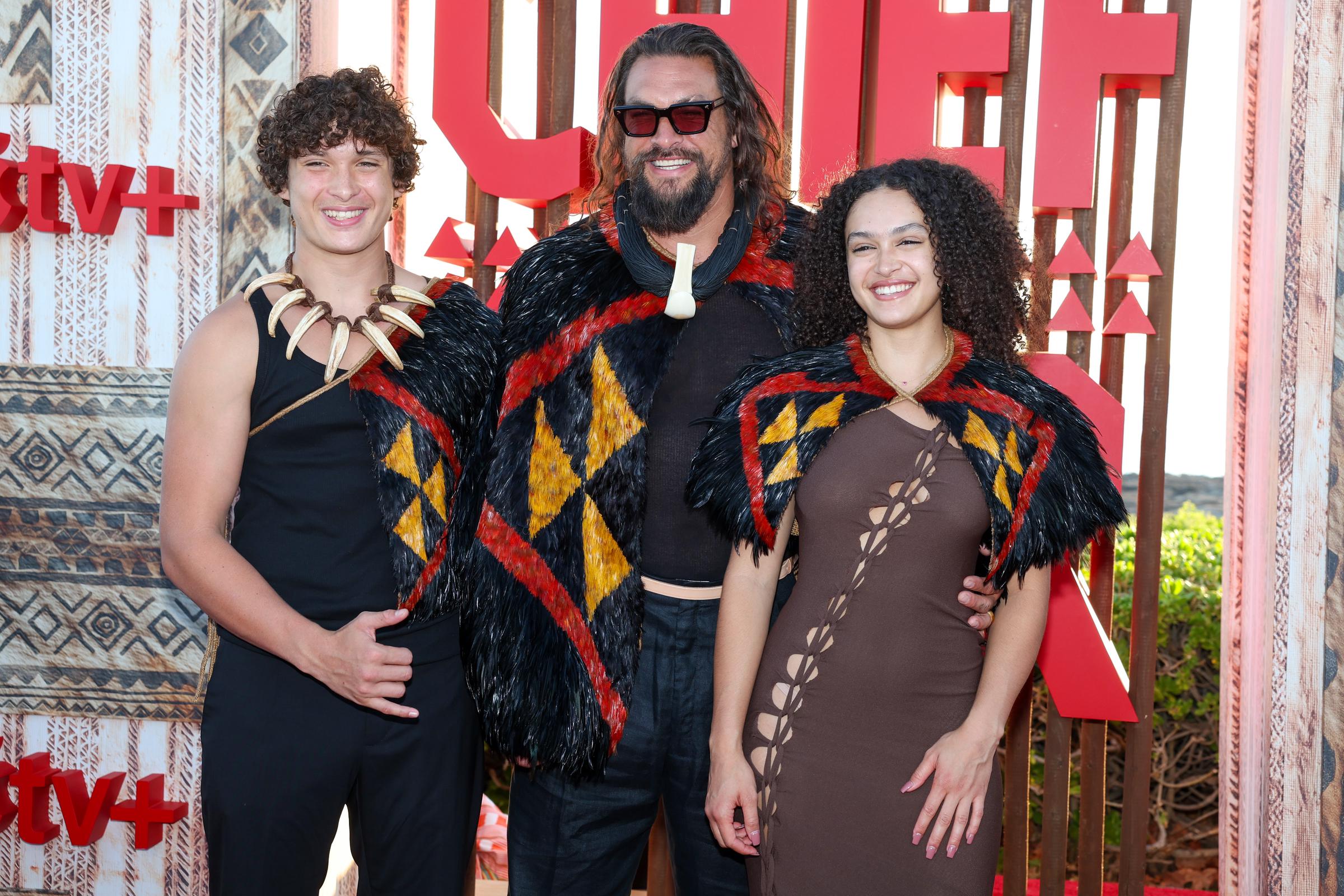 Nakoa-Wolf Momoa, Jason Momoa, and Lola Iolani Momoa seen at the world premiere of the Apple TV+ series “Chief of War” at the Ko Olina Beach Park on July 18, 2025, in Hawaii. | Source: Getty Images