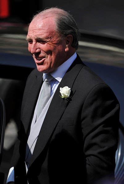 Captain Mark Phillips arrives to the Royal wedding of Zara Phillips and Mike Tindall at Canongate Kirk on July 30, 2011, in Edinburgh, Scotland. | Source: Getty Images.