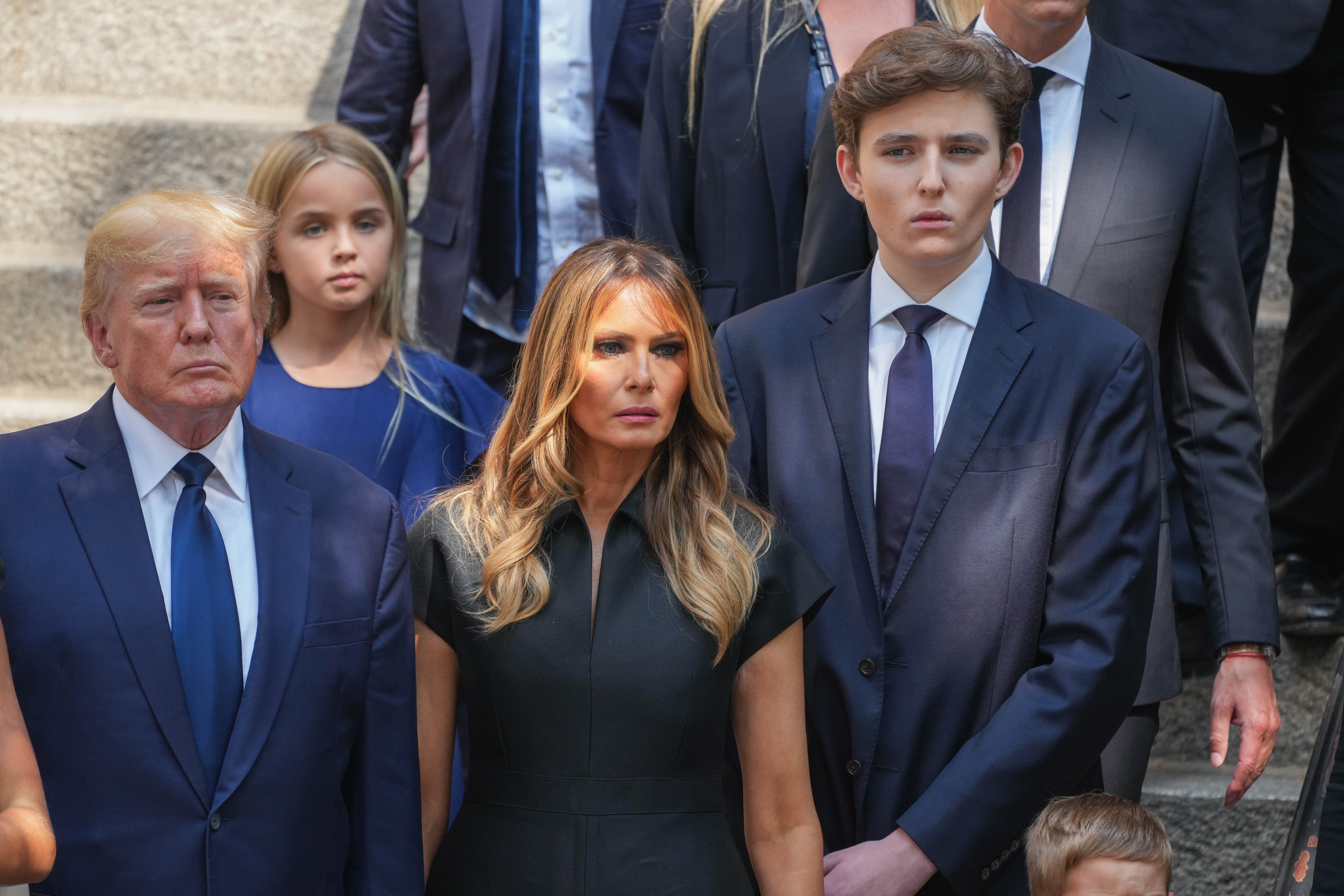 Donald, Melania, and Barron Trump at the funeral of Ivana Trump on July 20, 2022, in New York City. | Source: Getty Images