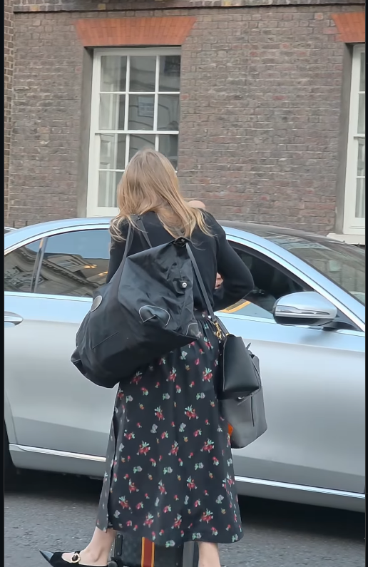 Princess Beatrice pauses momentarily beside the wrong car | Source: Instagram/kingsguardchannel