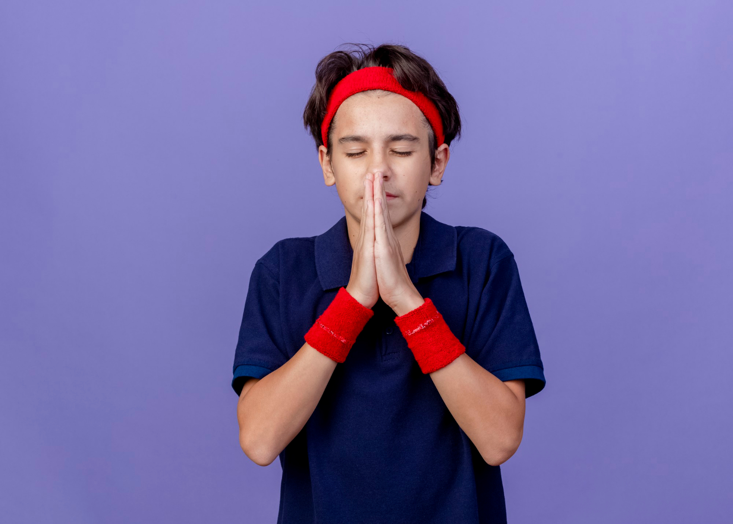 An apologetic boy | Source: Freepik