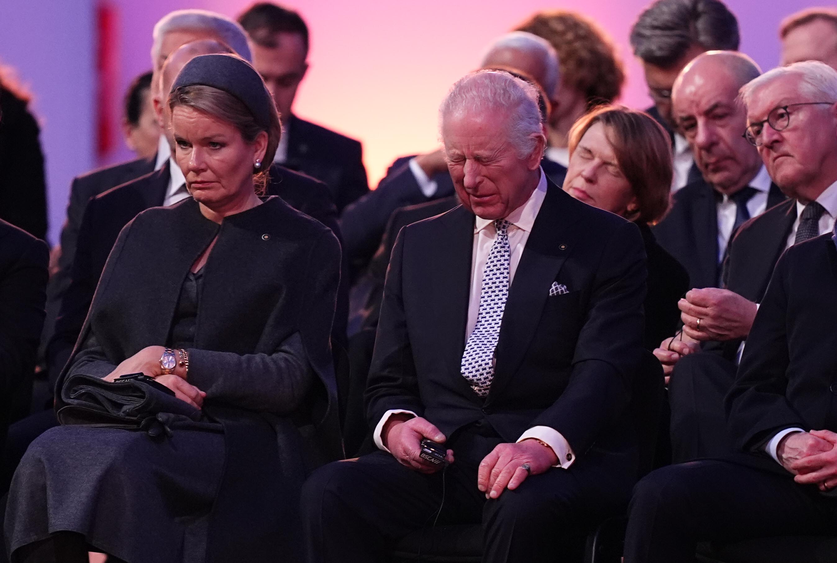 King Charles III listens to a survivor as they speak during commemorations at Auschwitz-Birkenau to mark 80 years since the liberation of the concentration camp in Oswiecim, Poland, on January 27, 2025 | Source: Getty Images