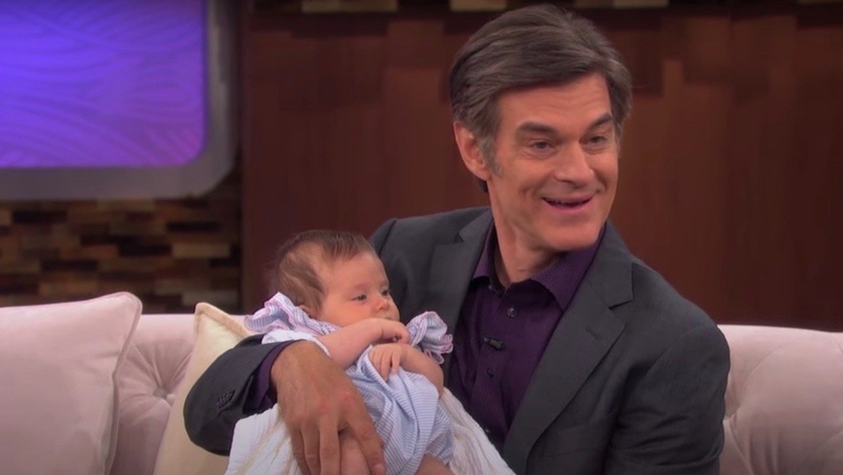 Dr. Oz and his granddaughter Philomena on the set of the Dr. Oz show | Source: YouTube/DoctorOz