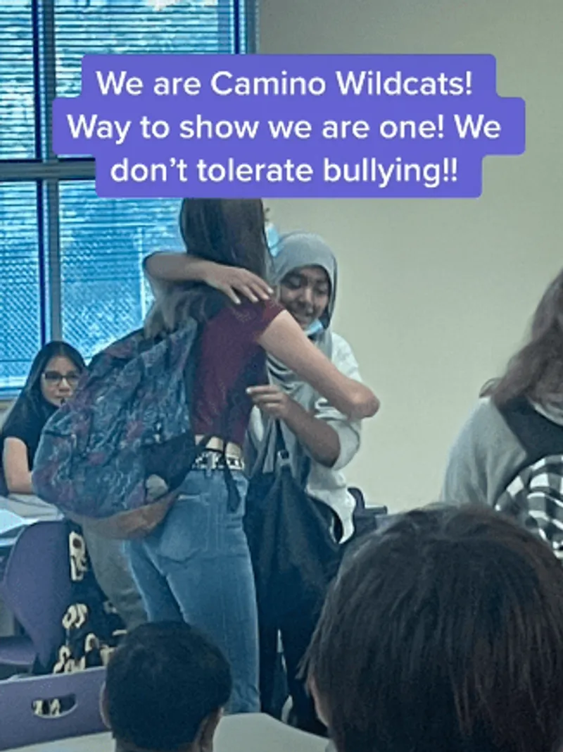 Students at Camino Real Middle School gather to escort a seventh-grade student to class. | Source: tiktok.com/575_msjanice