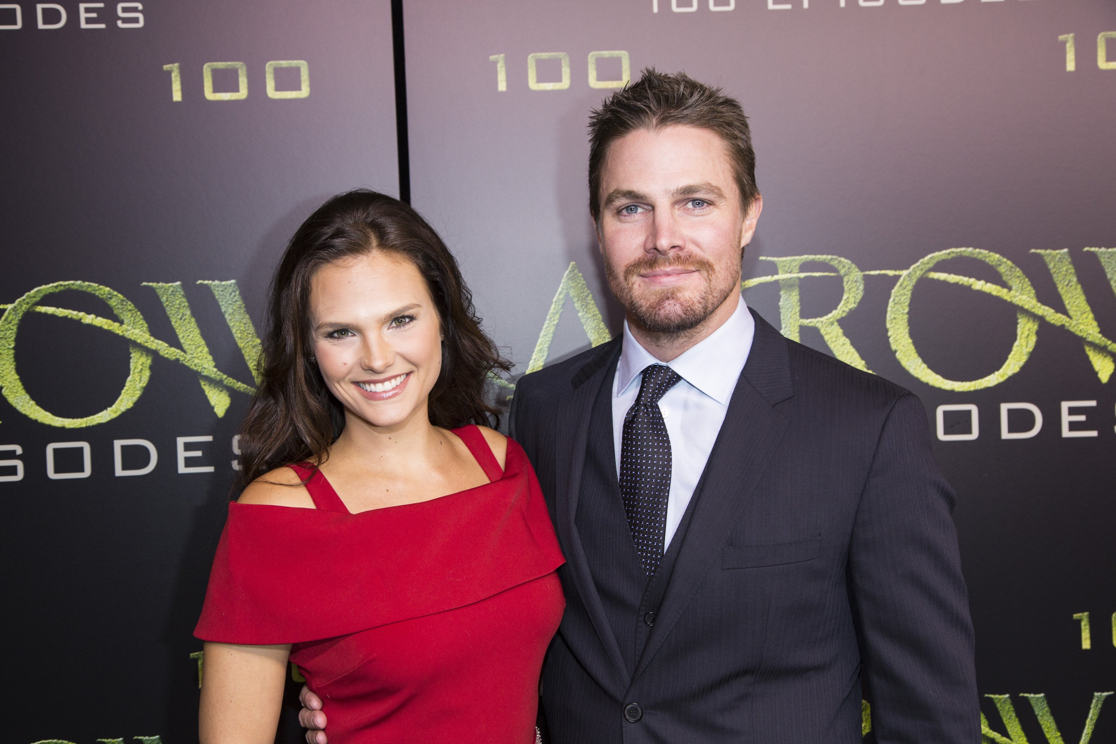 Actors Cassandra Jean and Stephen Amell arrive on the green carpet for the Celebration of the 100th Episode of CW's "Arrow" at the Fairmont Pacific Rim Hotel on Oct 22, 2016 in Vancouver, BC, Canada. | Source: Getty Images