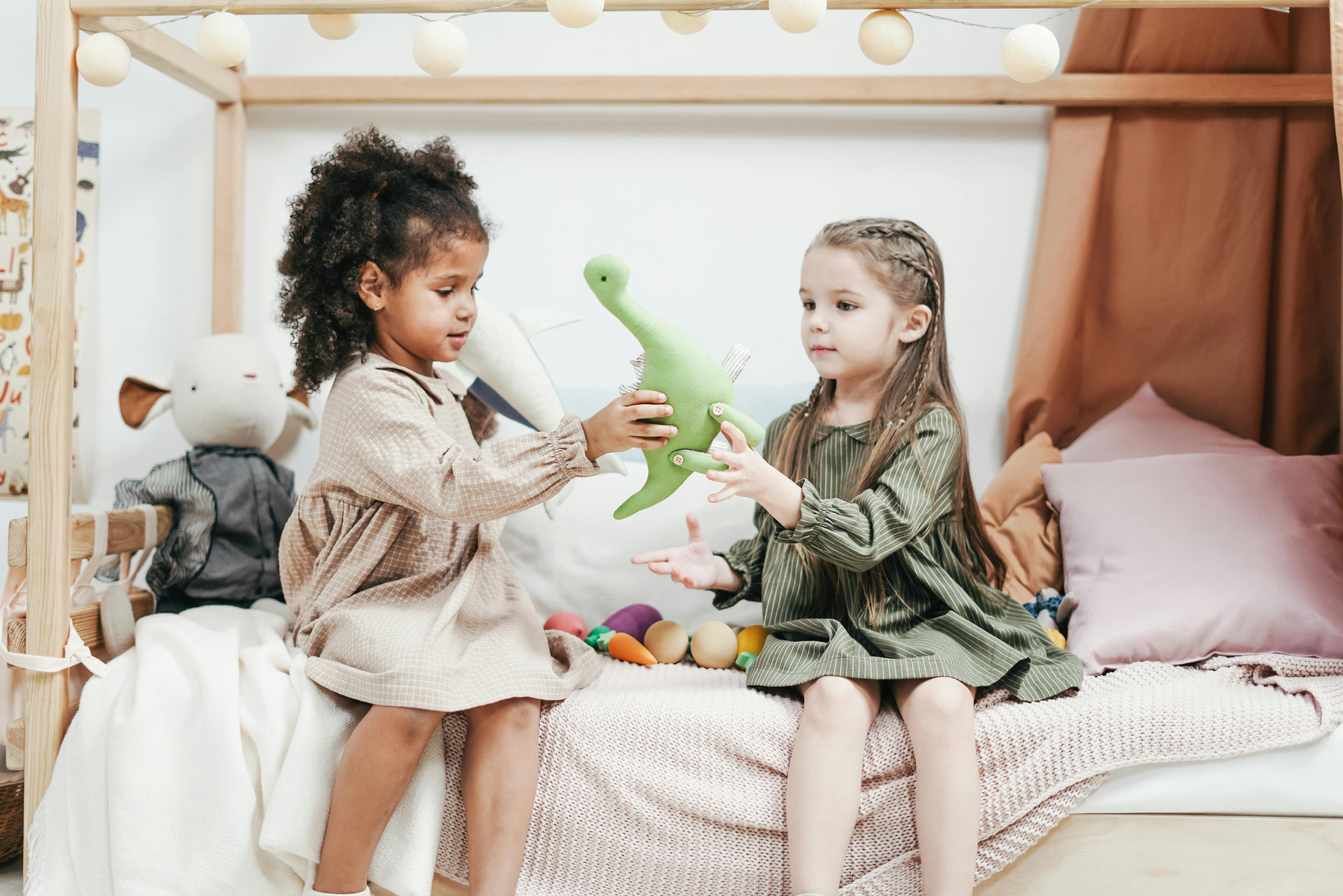Little girls playing with toys | Source: Pexels