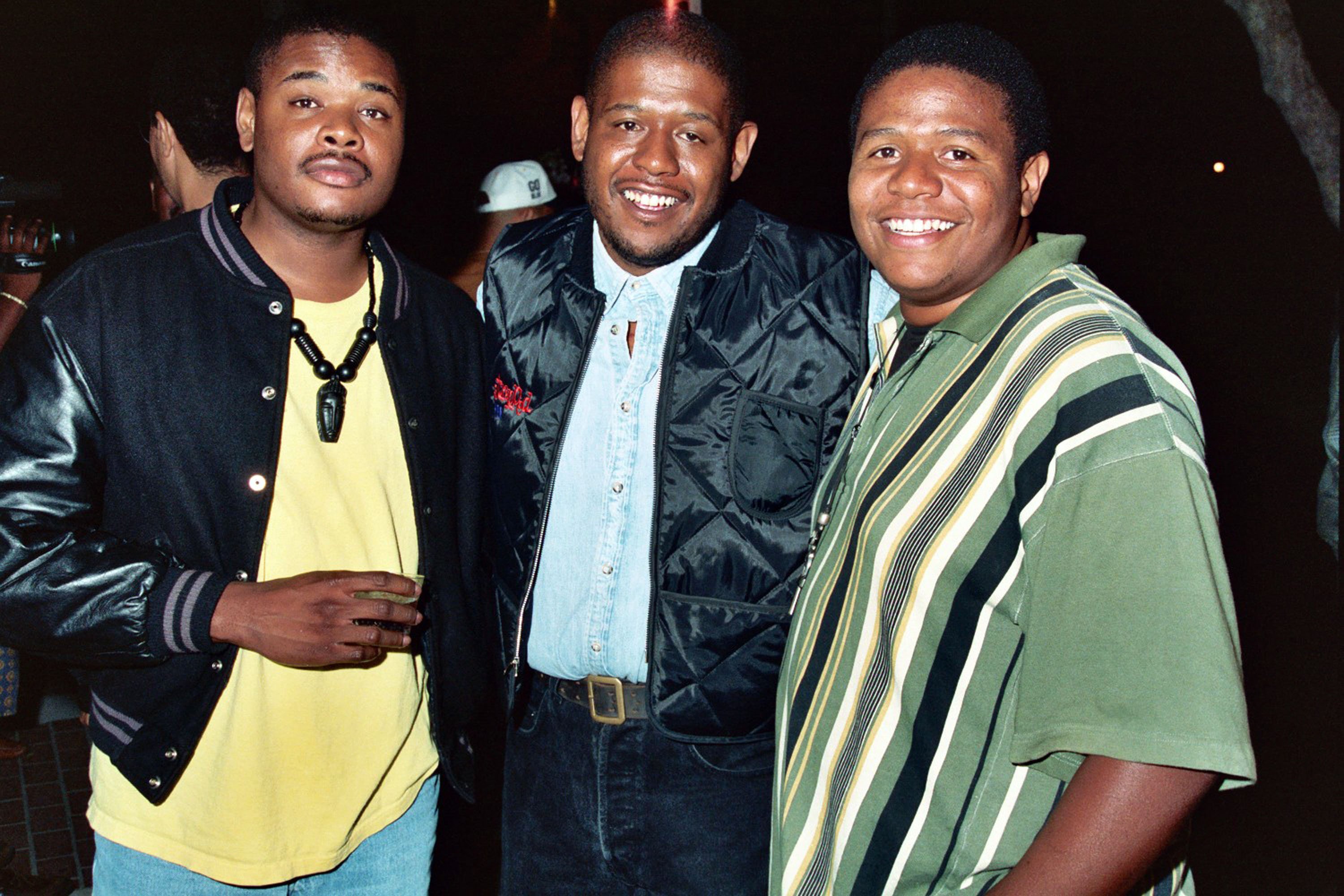 Kenn, Forest, and Damon Whitaker pose for a photo at HBO's screening of "Strapped" on September 2, 1993 | Source: Getty Images