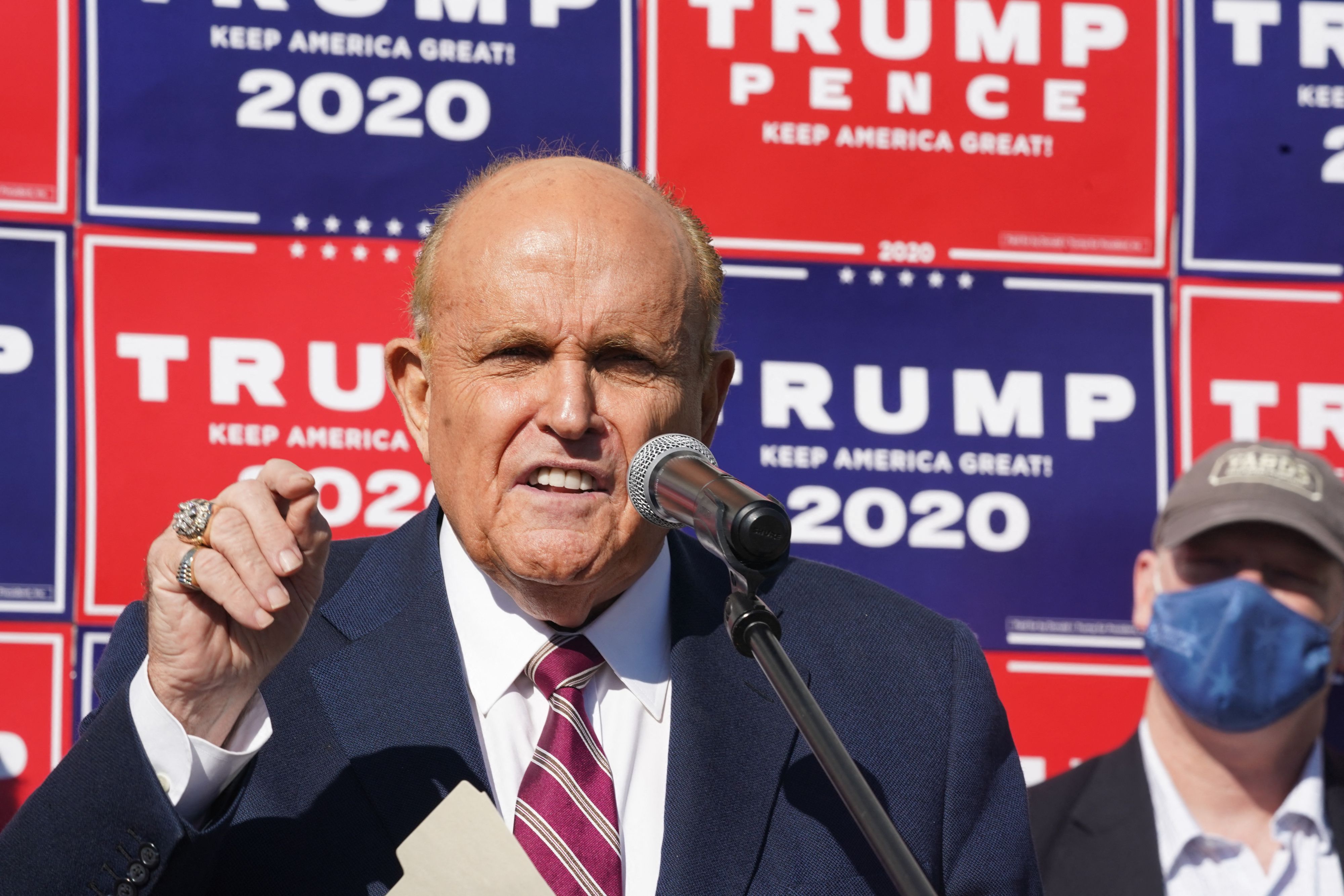 Rudy Giuliani speaks at a news conference in the parking lot of a landscaping company on November 7, 2020 in Philadelphia | Source: Getty Images