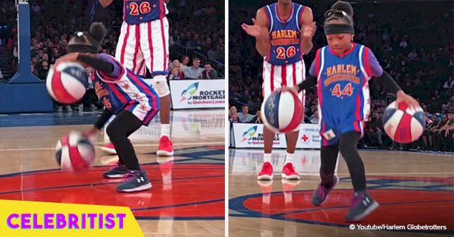 8-year-old girl takes two basketballs and wows the crowd with her dribbling skills