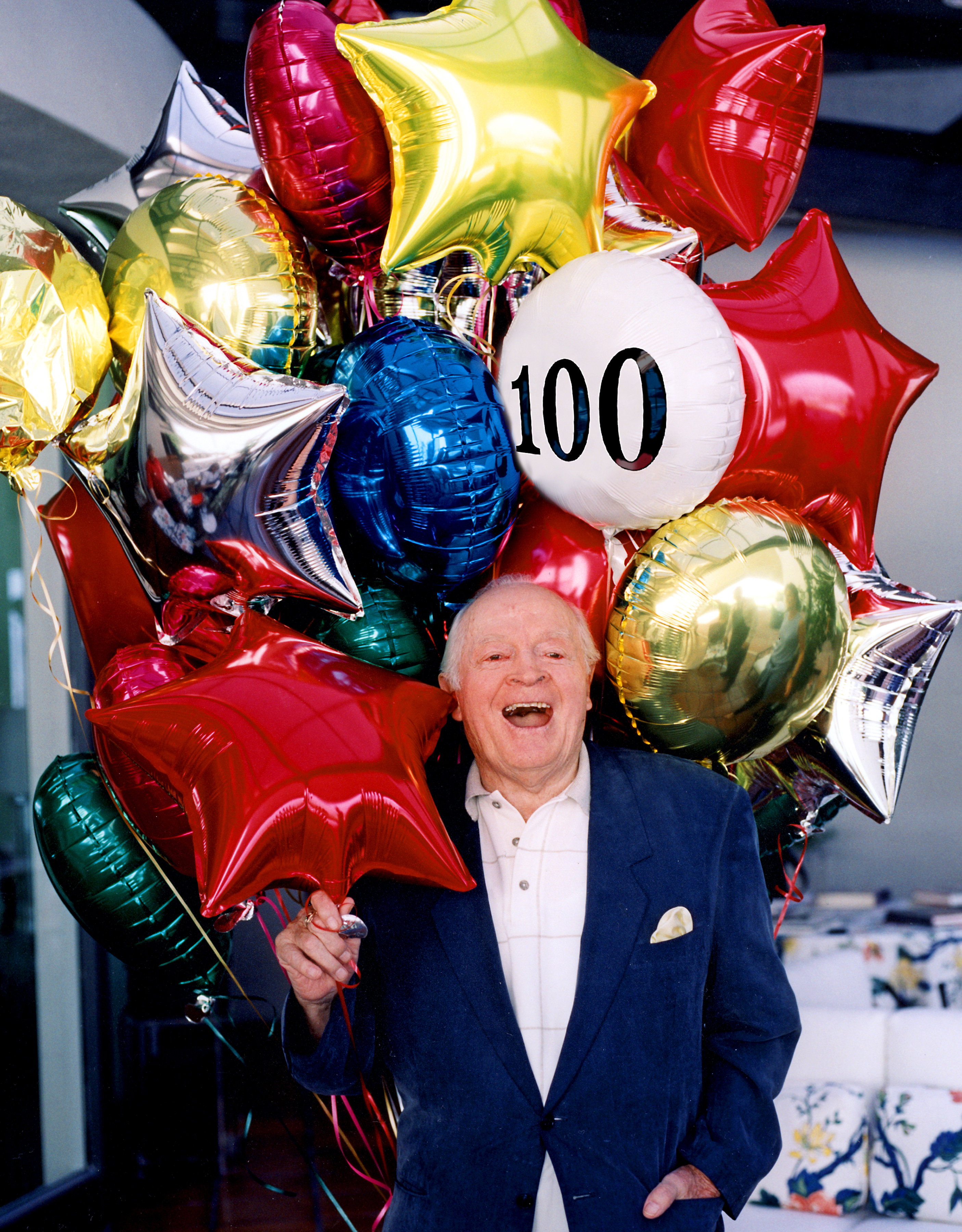 Bob Hope celebrating his 100th birthday at his Palm Springs, California home in 2003 | Source: Getty Images