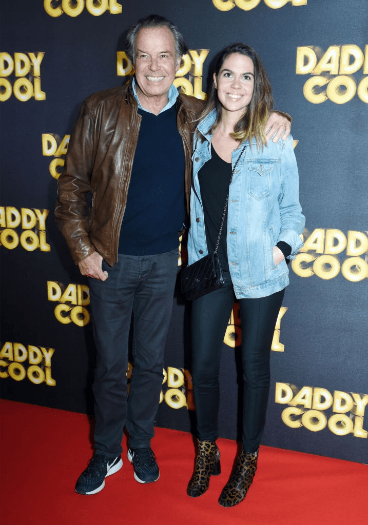 Le comédien Michel Leeb et sa fille Fanny Leeb assistent à la première parisienne de "Daddy Cool" à l'UGC Cine Cite Bercy le 26 octobre 2017 à Paris, France. | Photo : Getty Images