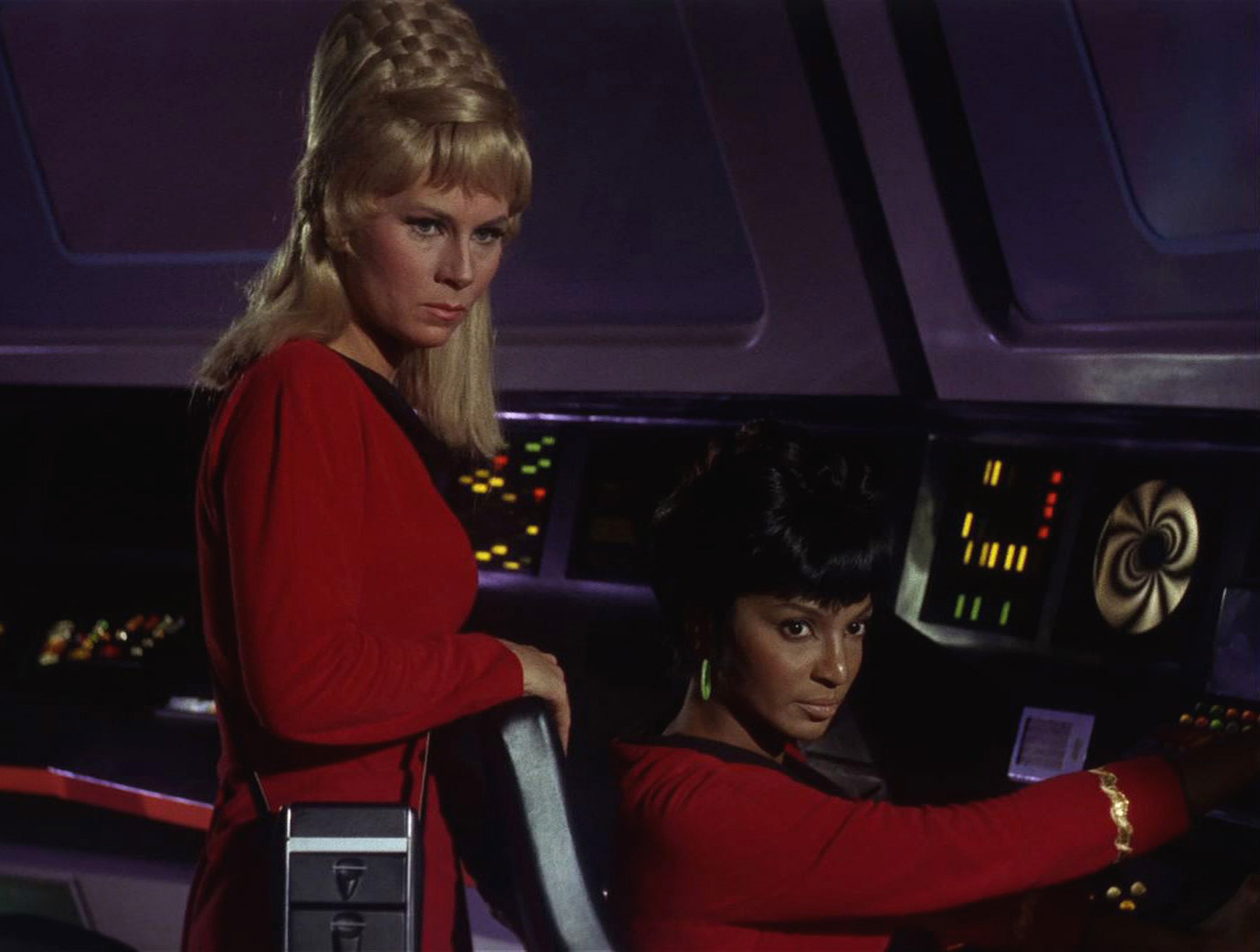 Grace Lee Whitney, as Yeoman Janice Rand, and Nichelle Nichols, as Lieutenant Uhura, on the premiere episode of "Star Trek," on September 8, 1966. | Source: Getty Images