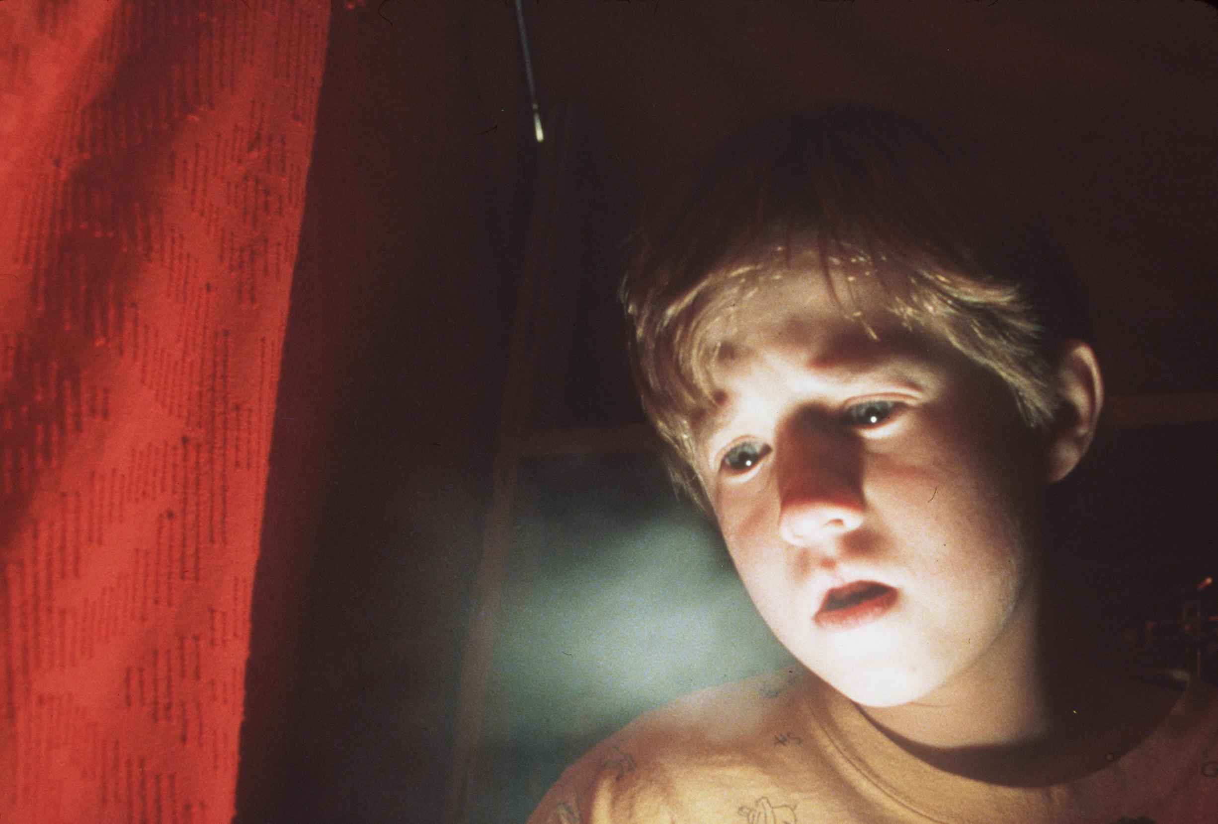 The young star on the set of "The Sixth Sense" in 1999. | Source: Getty Images