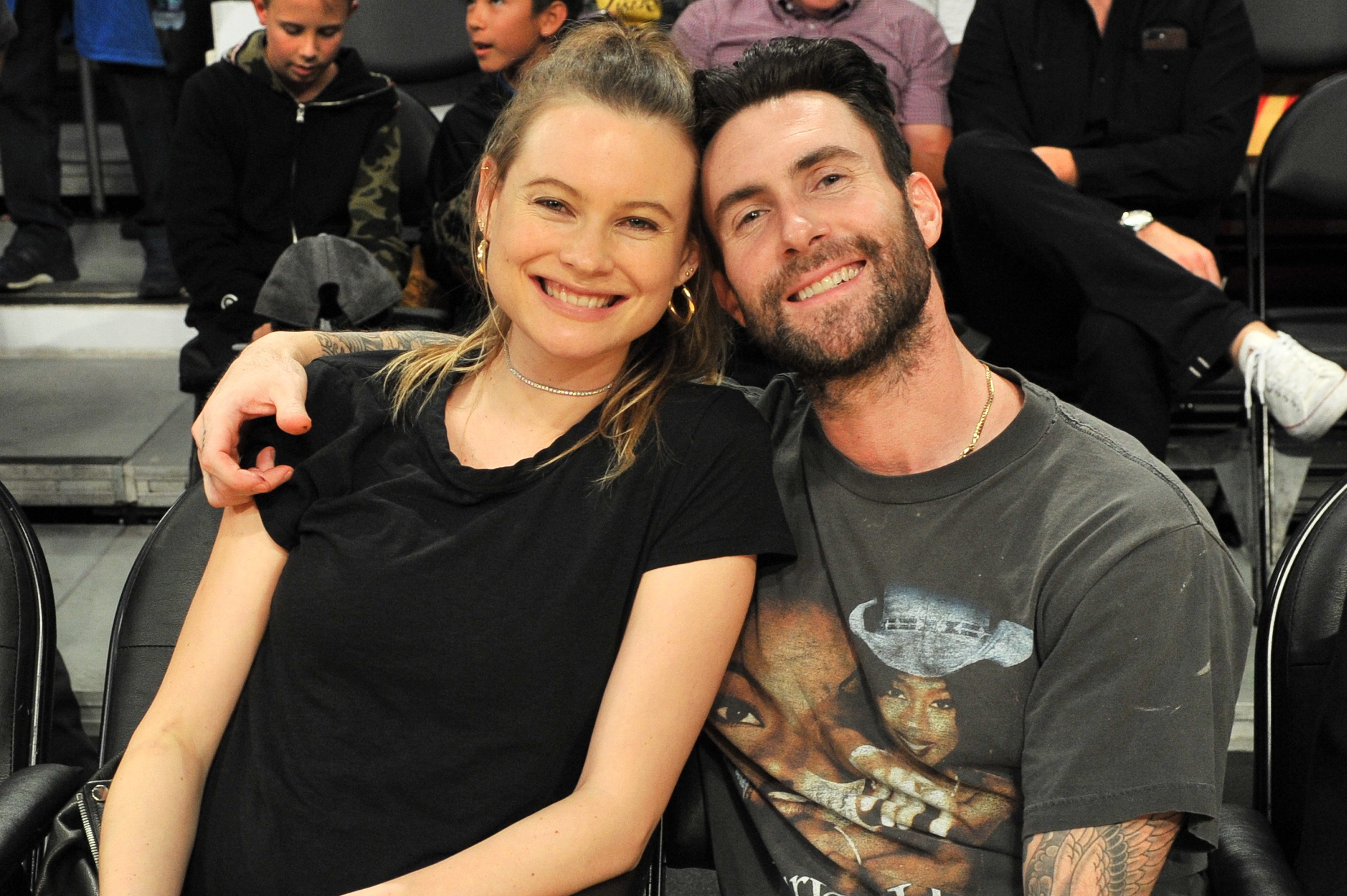 Behati Prinsloo and Adam Levine at the basketball game between the Los Angeles Lakers and the Philadelphia 76ers on November 15, 2017, in Los Angeles, California. | Source: Getty Images