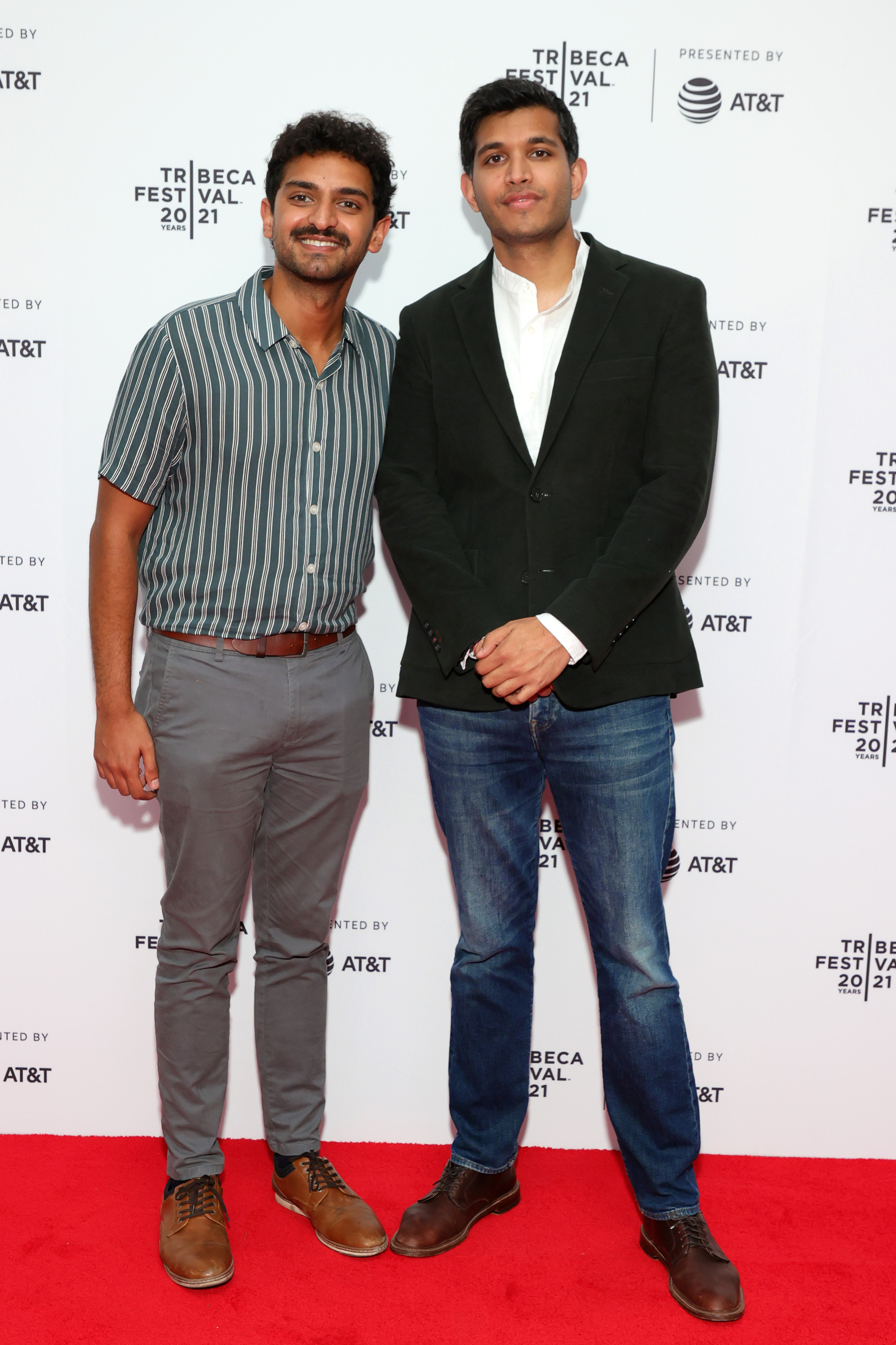 Karan Soni and Roshan Sethi pose at the 2021 Tribeca Festival Premiere of "7 Days" at Brooklyn Commons at MetroTech on June 10, 2021, in New York City | Source: Getty Images