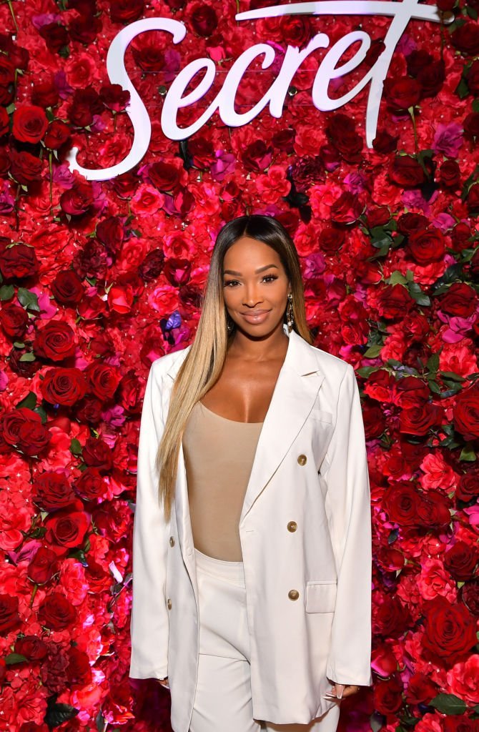 Malika Haqq poses during  the launch party for "Secret with Essential Oils" on October 1, 2019 in Beverly Hills, California. | Source: Getty Images