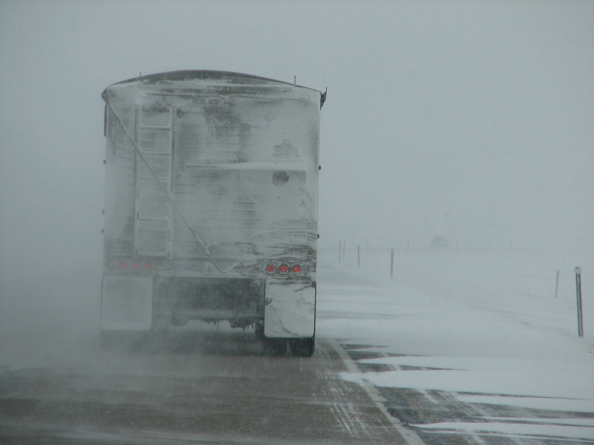 Pictured - A truck driving in the storm weather conditions | Source: Pixabay