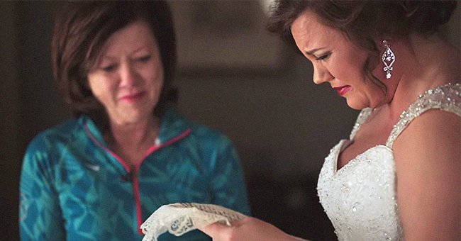 A bride reads the letter her mother wrote for her when she was a baby | Photo: youtube.com/The Film Poets