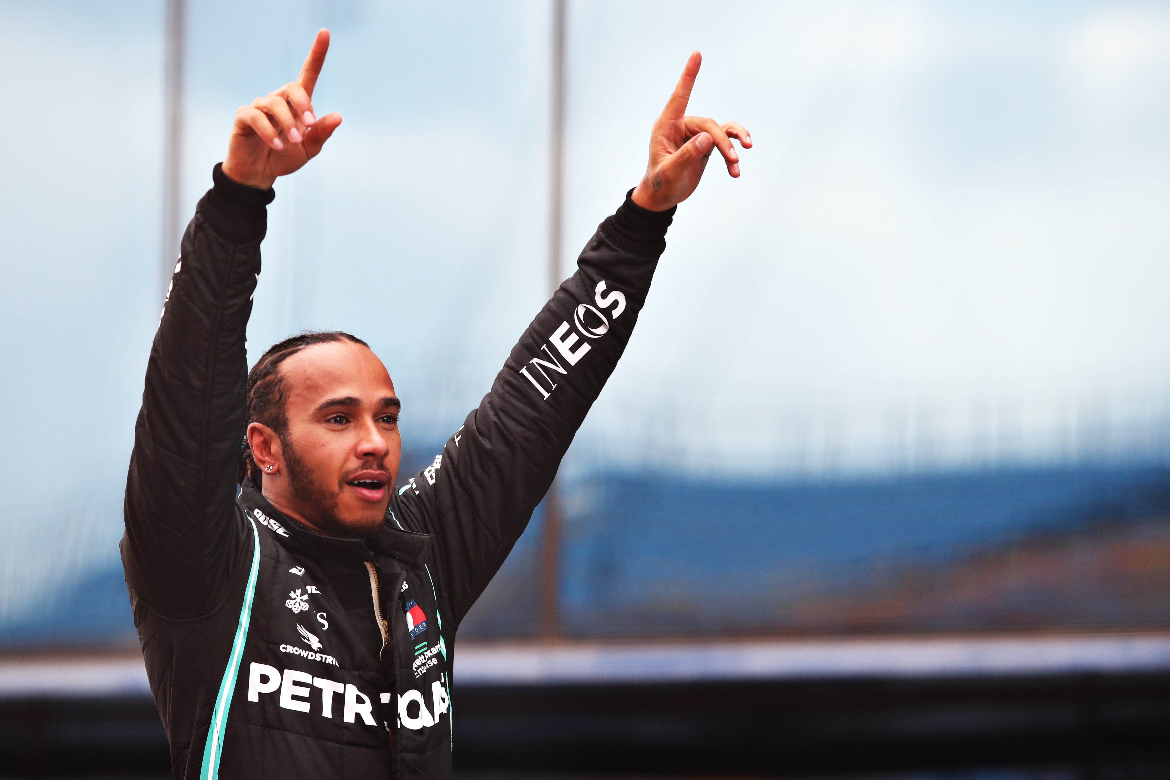Mercedes GP racer Lewis Hamilton celebrating after winning 7th F1 World Drivers Championship at Intercity Istanbul Park in Istanbul, Turkey | Photo: Tolga Bozoglu - Pool/Getty Images